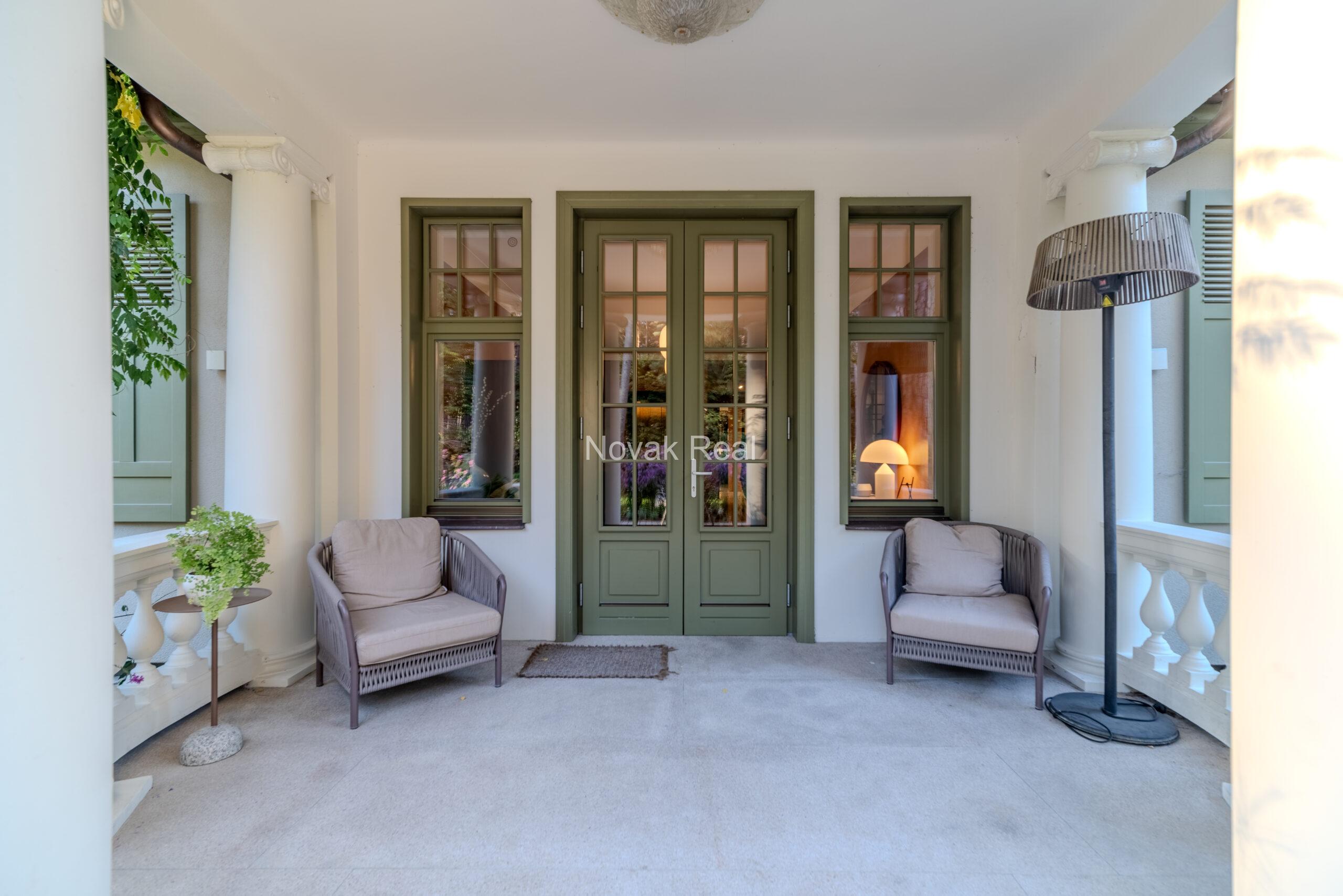 In Lielupe, close to the sea and a pine park, an elegant, renovated three-storey villa is offered for sale