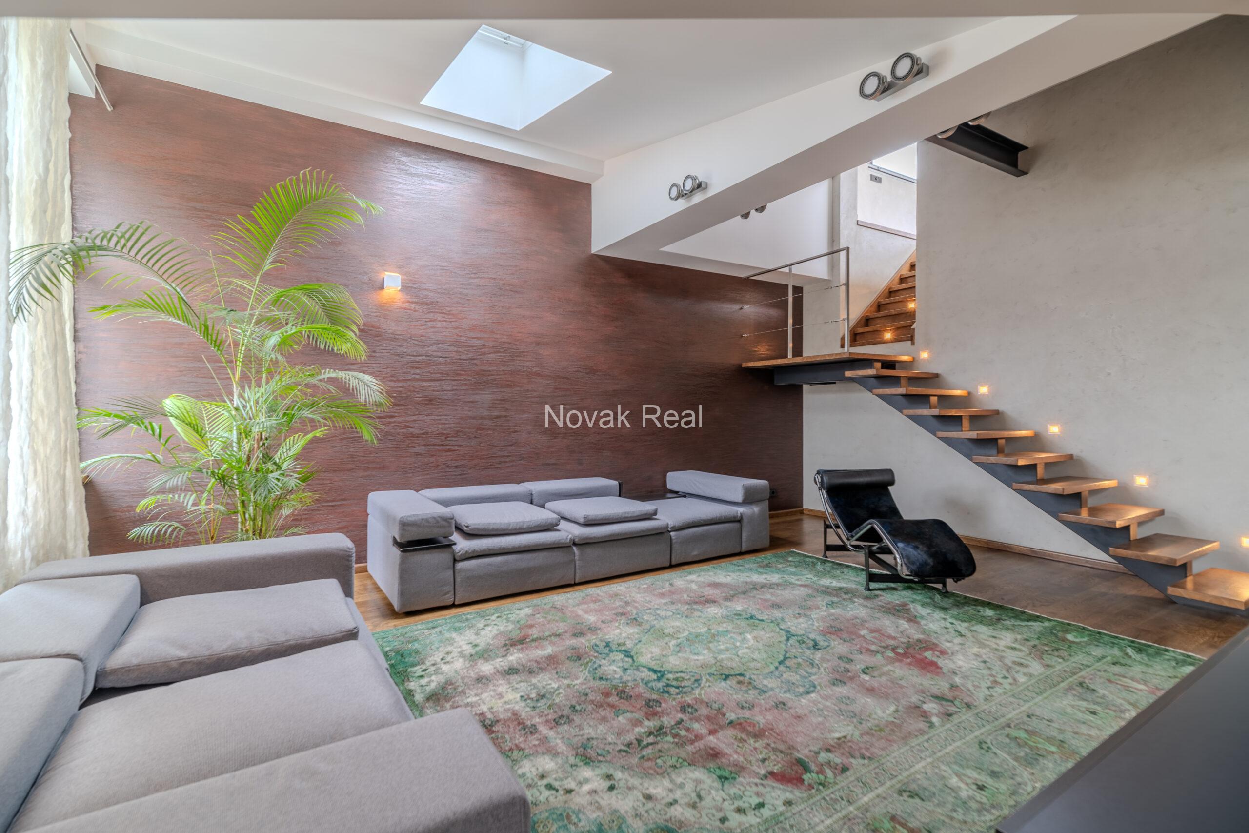 A spacious five-room attic apartment is offered for sale in the Quiet Centre of Riga