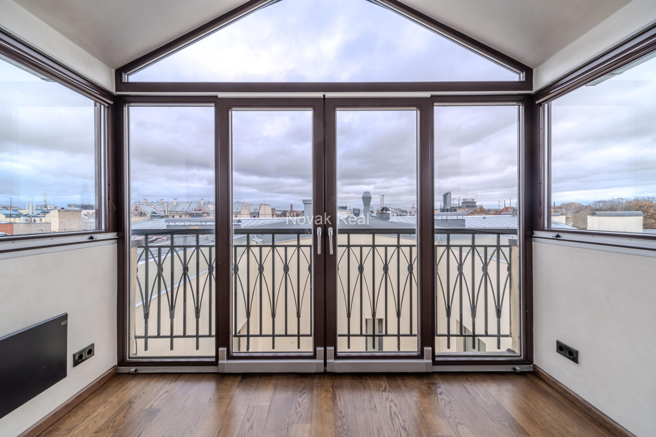 A spacious five-room attic apartment is offered for sale in the Quiet Centre of Riga