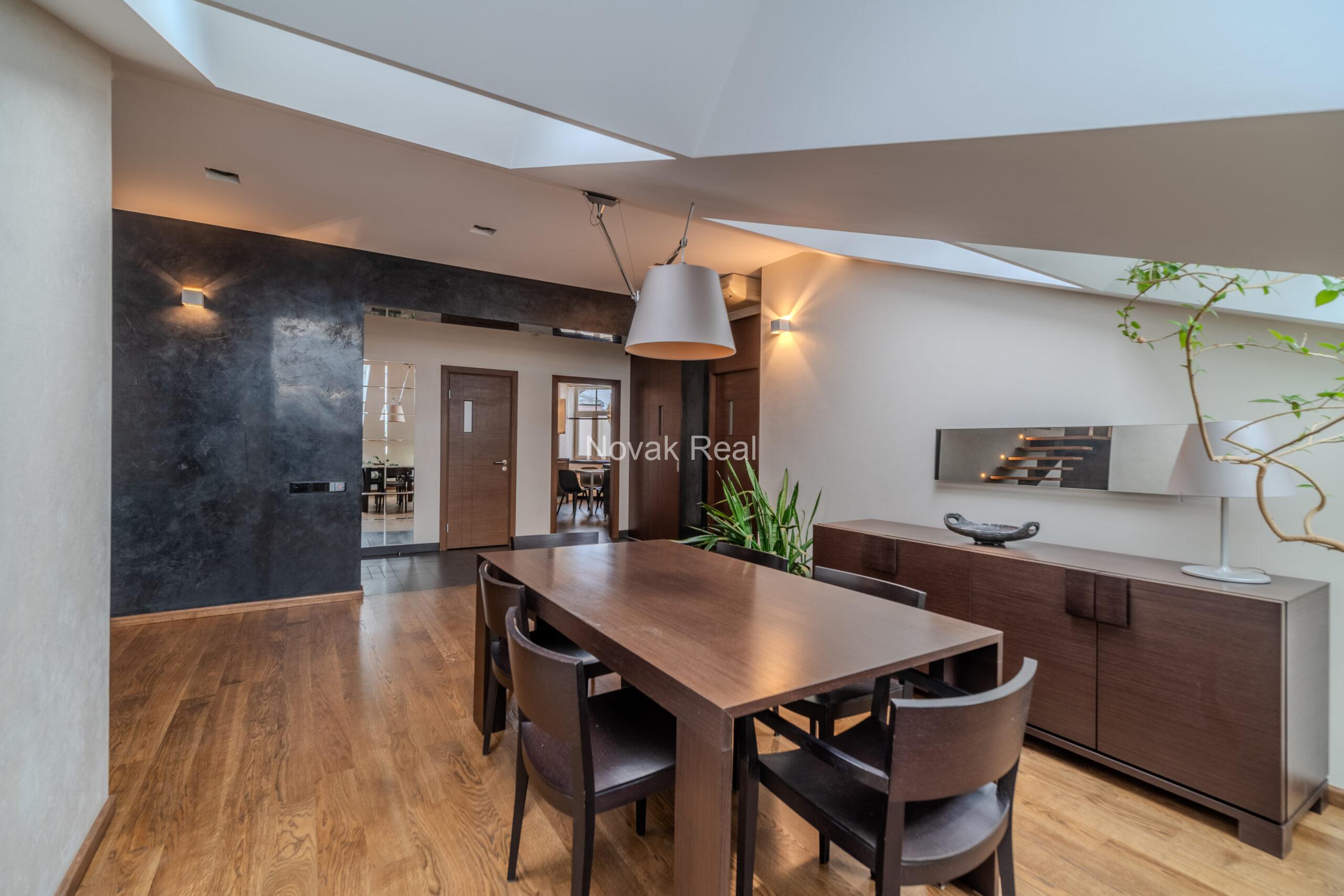A spacious five-room attic apartment is offered for sale in the Quiet Centre of Riga