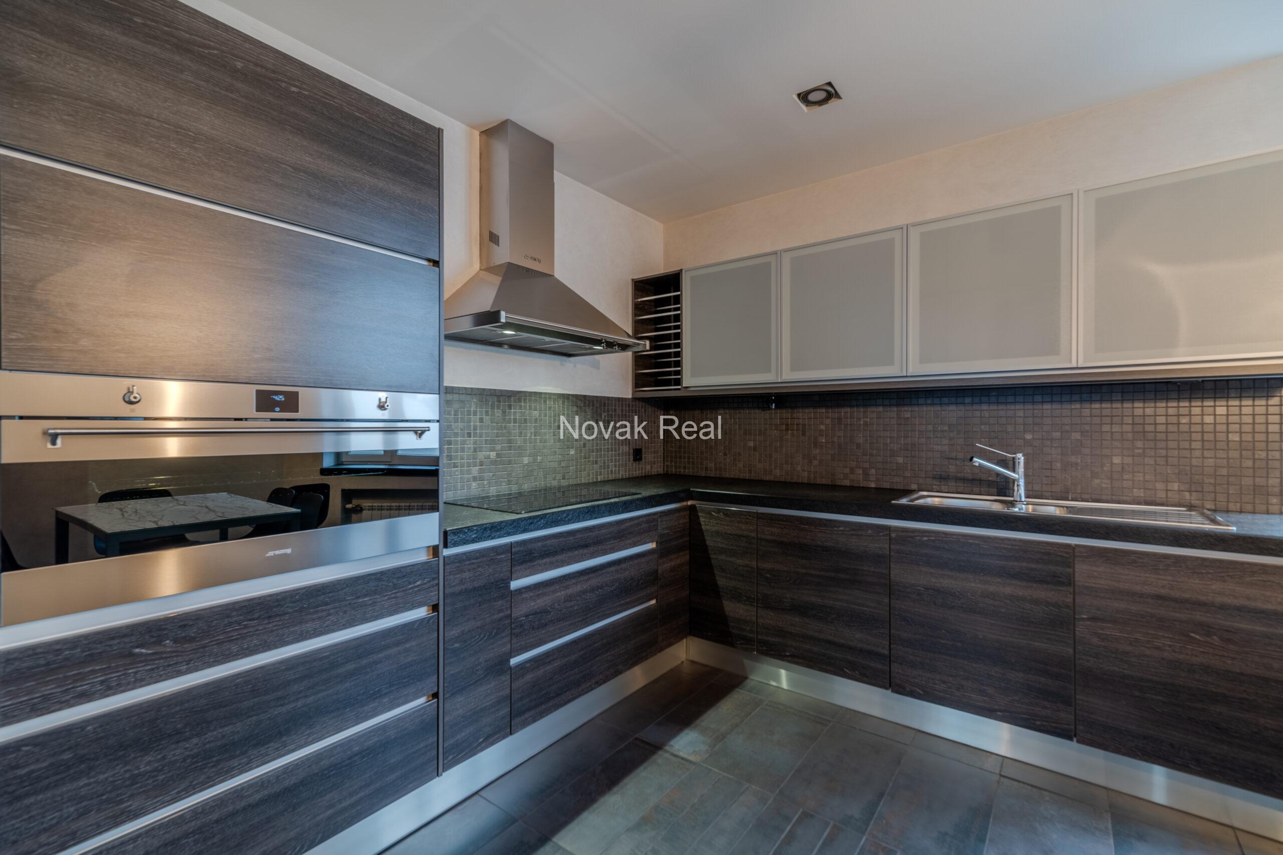 A spacious five-room attic apartment is offered for sale in the Quiet Centre of Riga