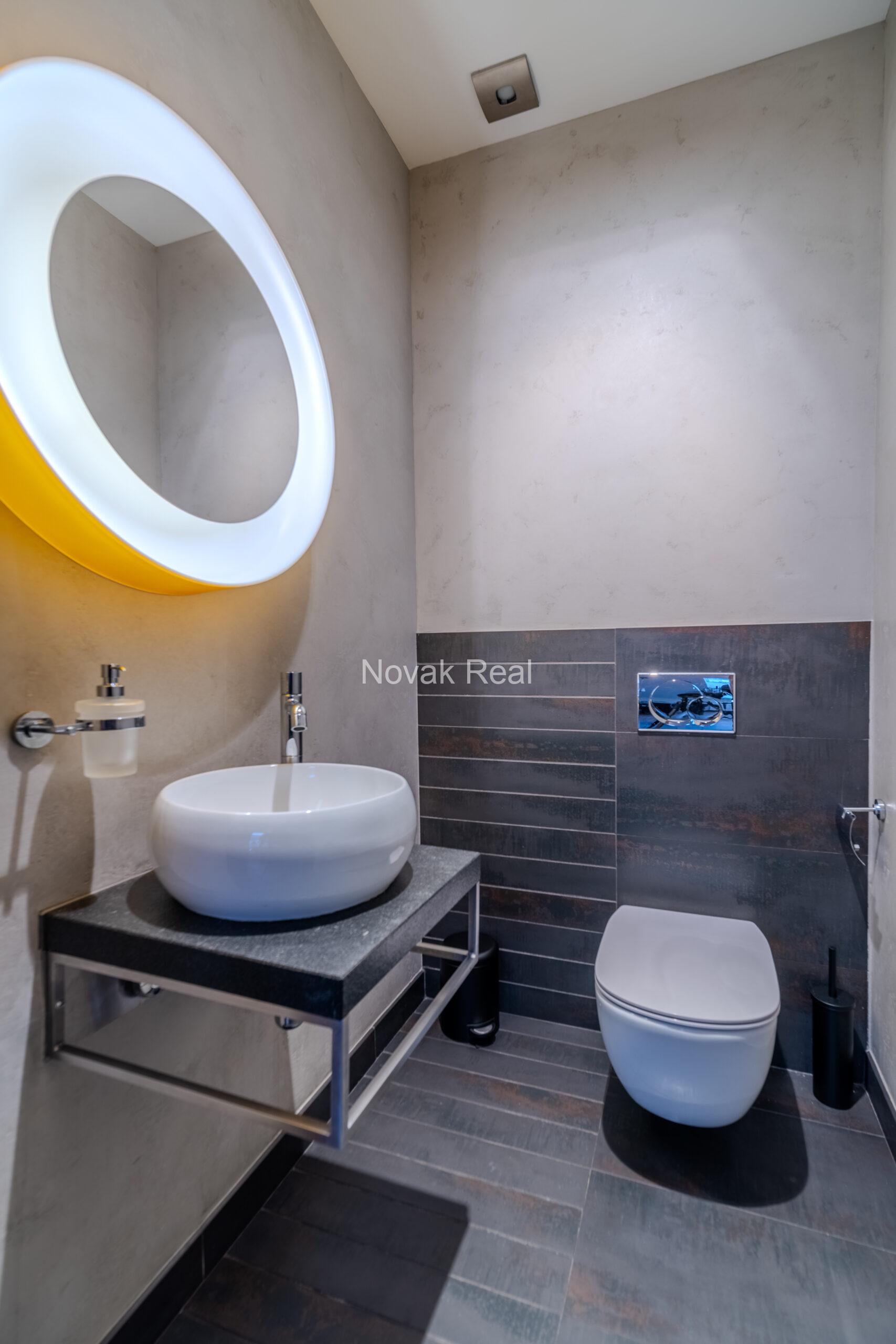 A spacious five-room attic apartment is offered for sale in the Quiet Centre of Riga