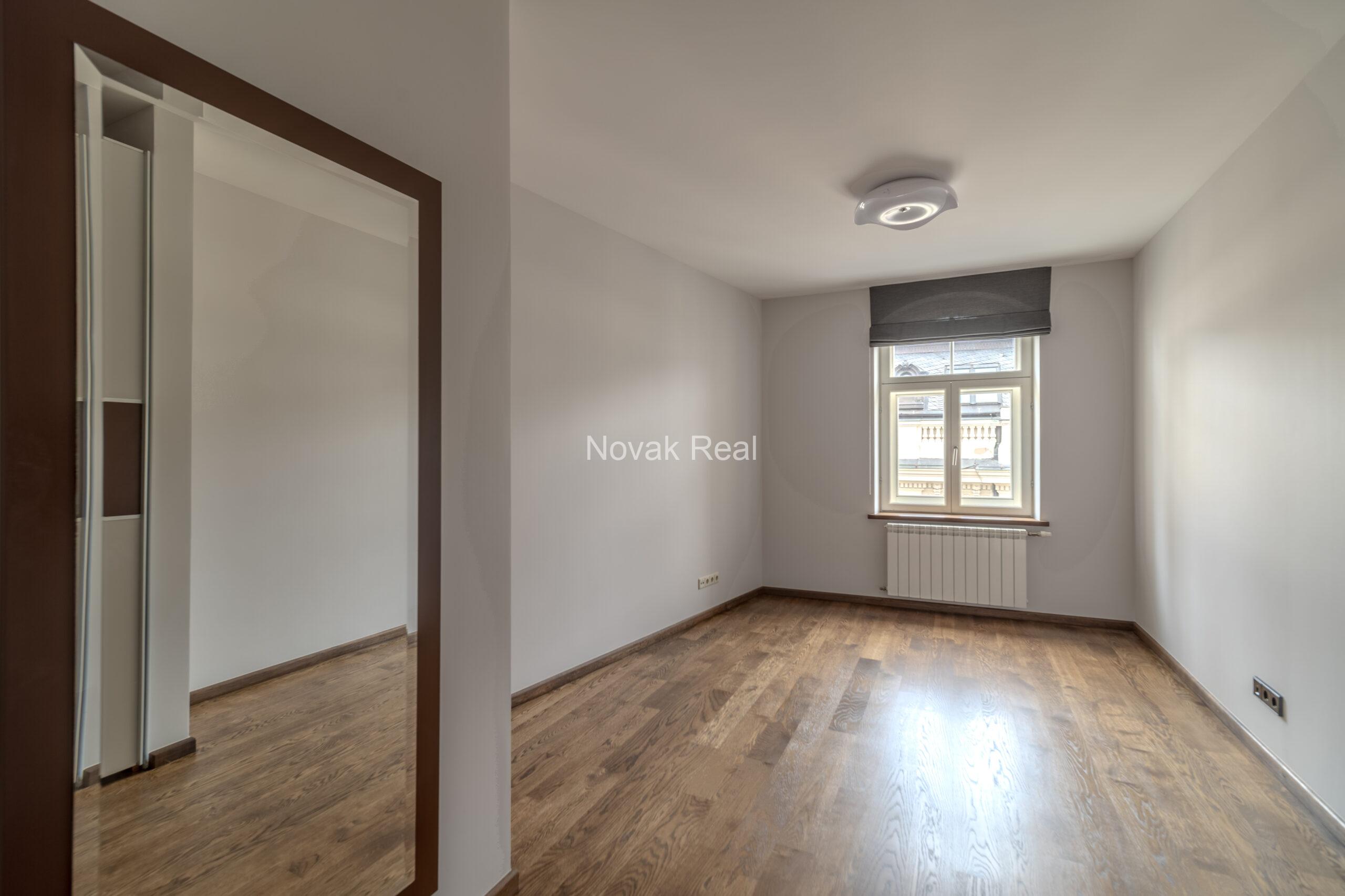 A spacious five-room attic apartment is offered for sale in the Quiet Centre of Riga