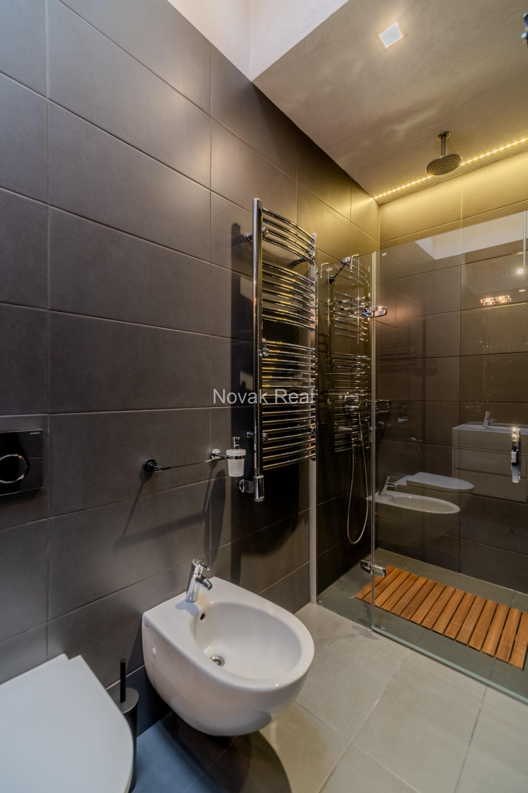 A spacious five-room attic apartment is offered for sale in the Quiet Centre of Riga