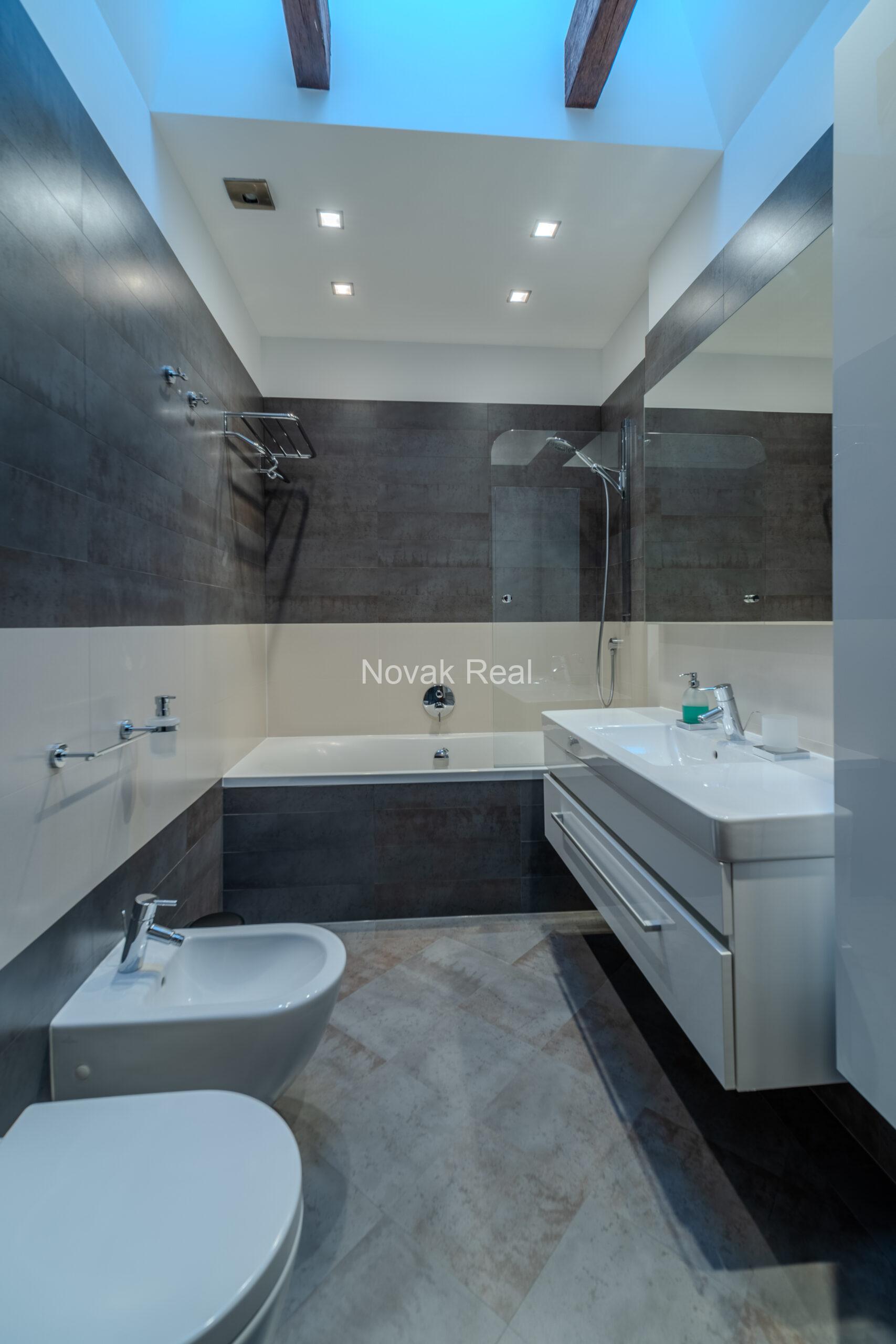 A spacious five-room attic apartment is offered for sale in the Quiet Centre of Riga