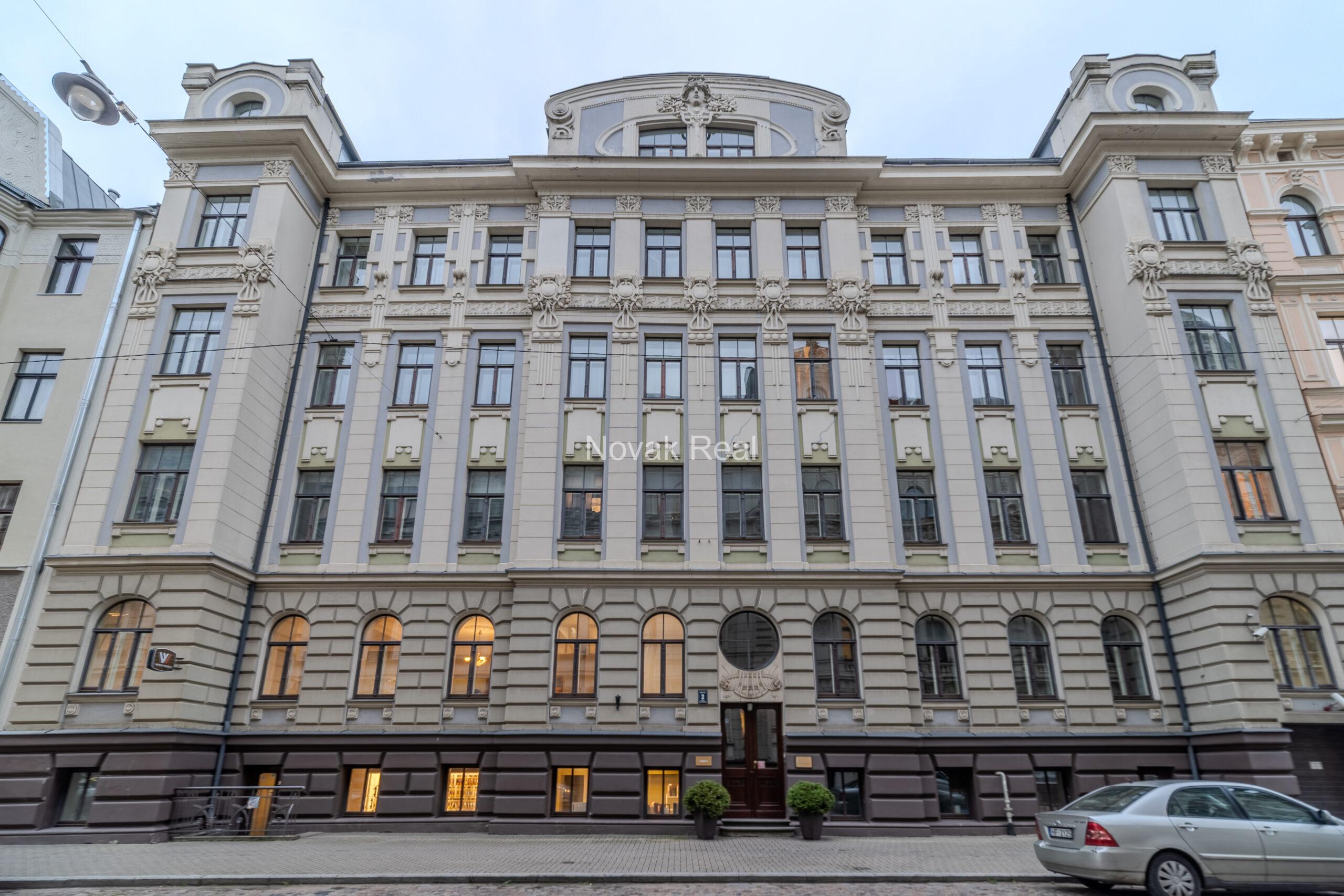 A spacious five-room attic apartment is offered for sale in the Quiet Centre of Riga
