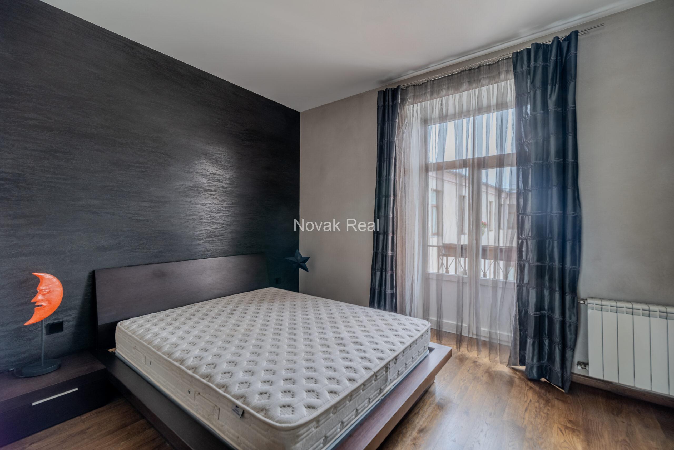 A spacious five-room attic apartment is offered for sale in the Quiet Centre of Riga