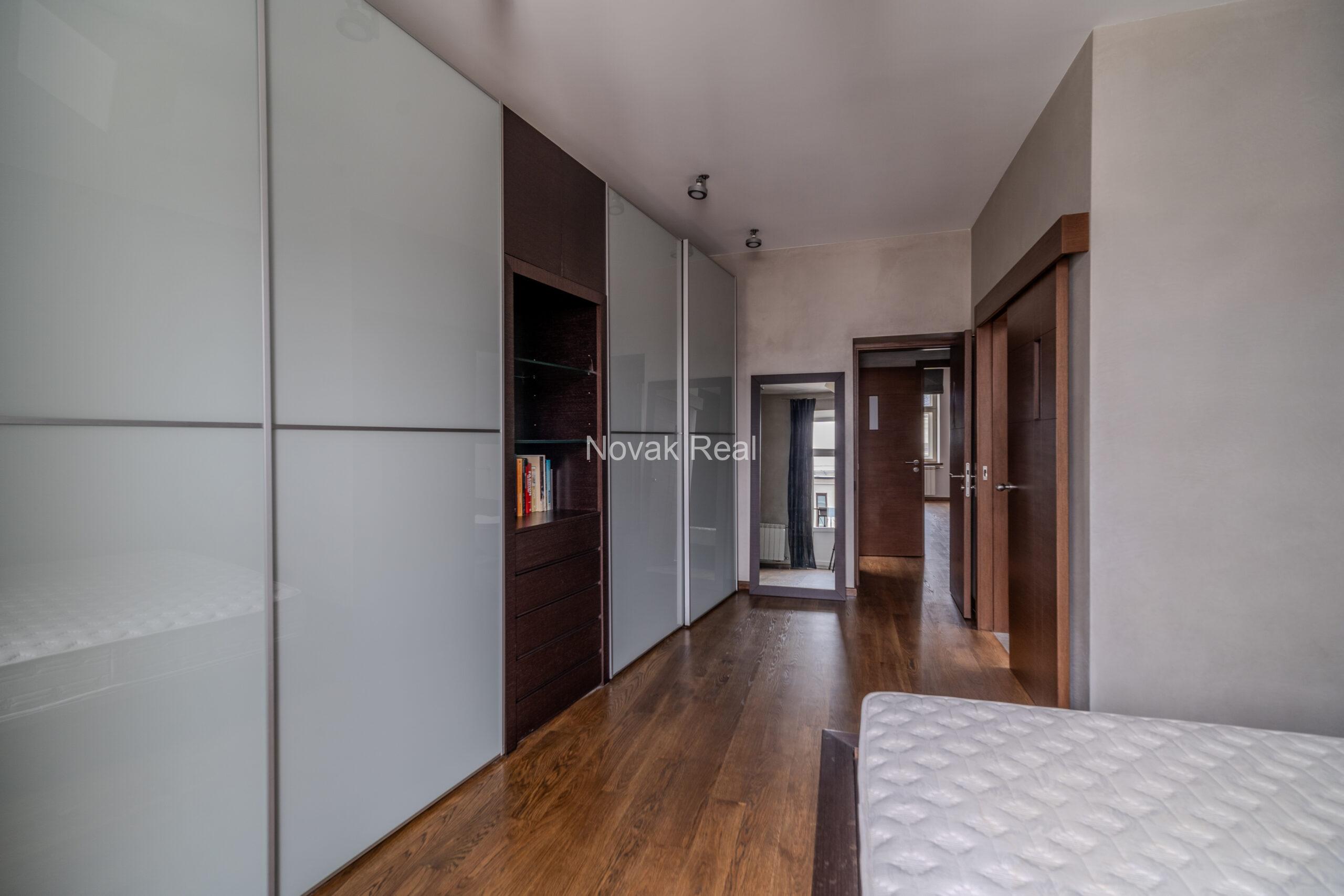 A spacious five-room attic apartment is offered for sale in the Quiet Centre of Riga