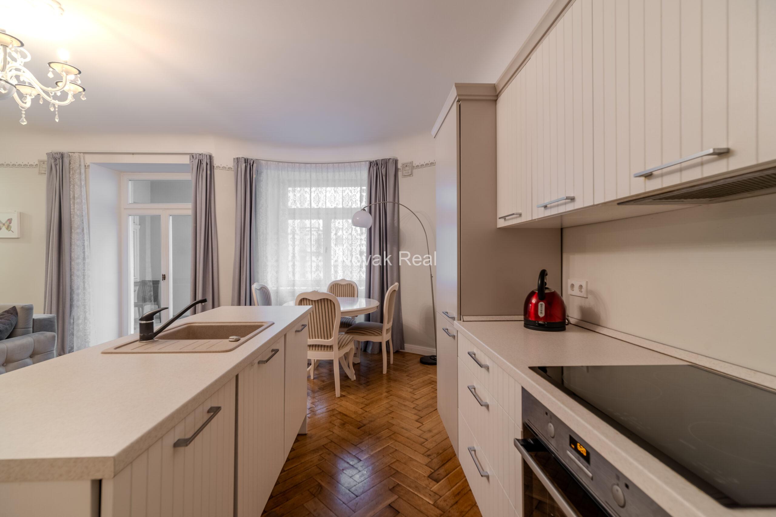 Two-room apartment with a balcony on the facade in a prestigious embassy district