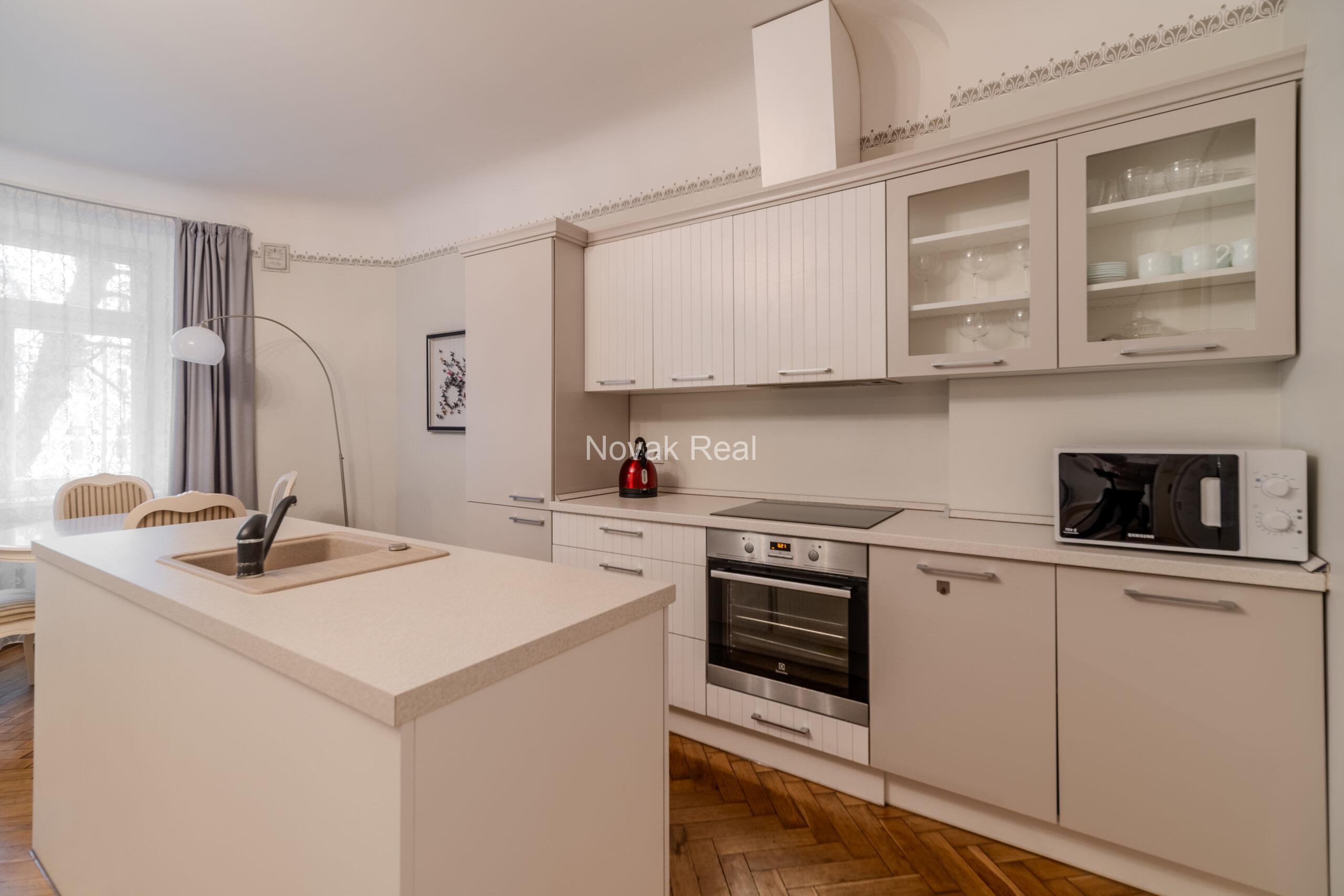 Two-room apartment with a balcony on the facade in a prestigious embassy district