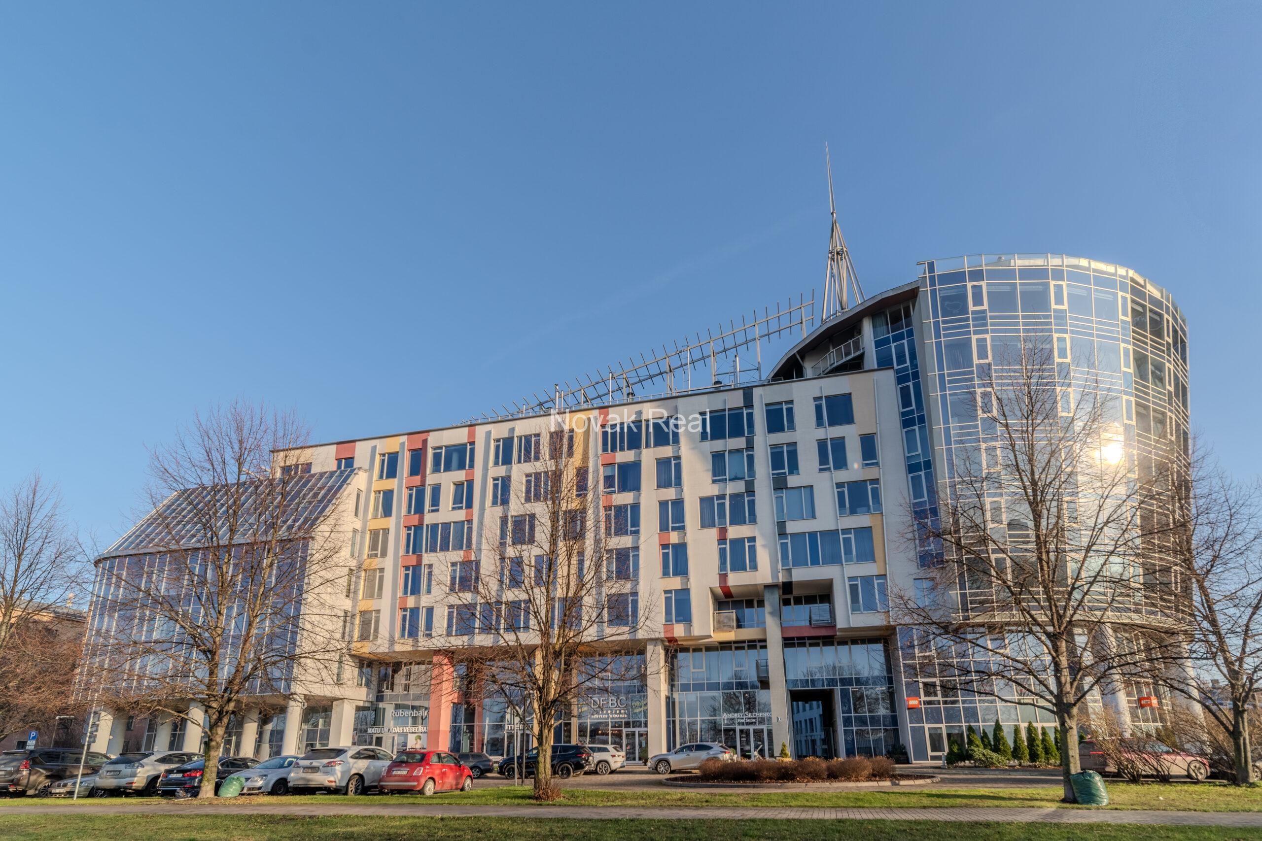 A three-room apartment is offered for sale in the city center with a river view