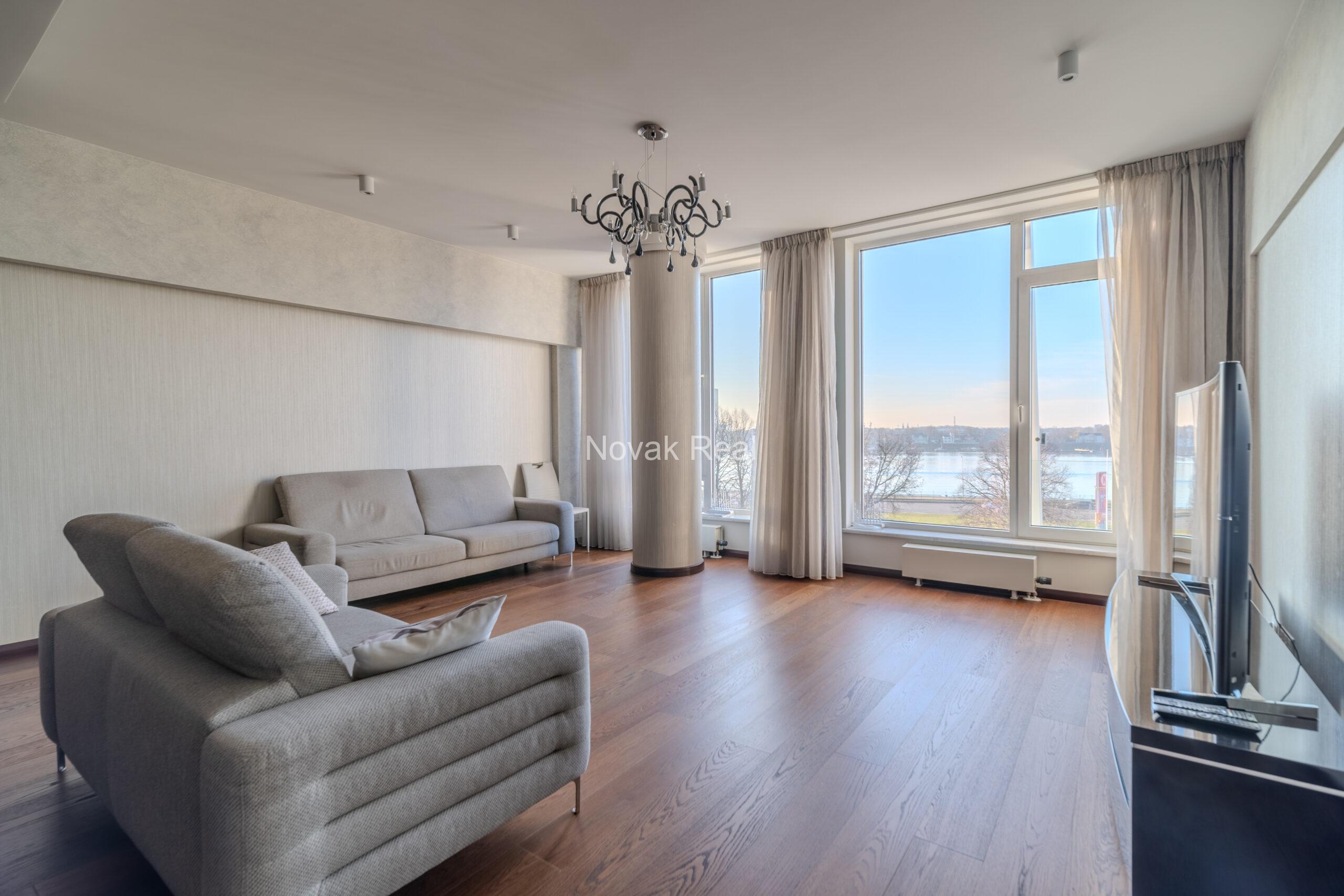 A three-room apartment is offered for sale in the city center with a river view