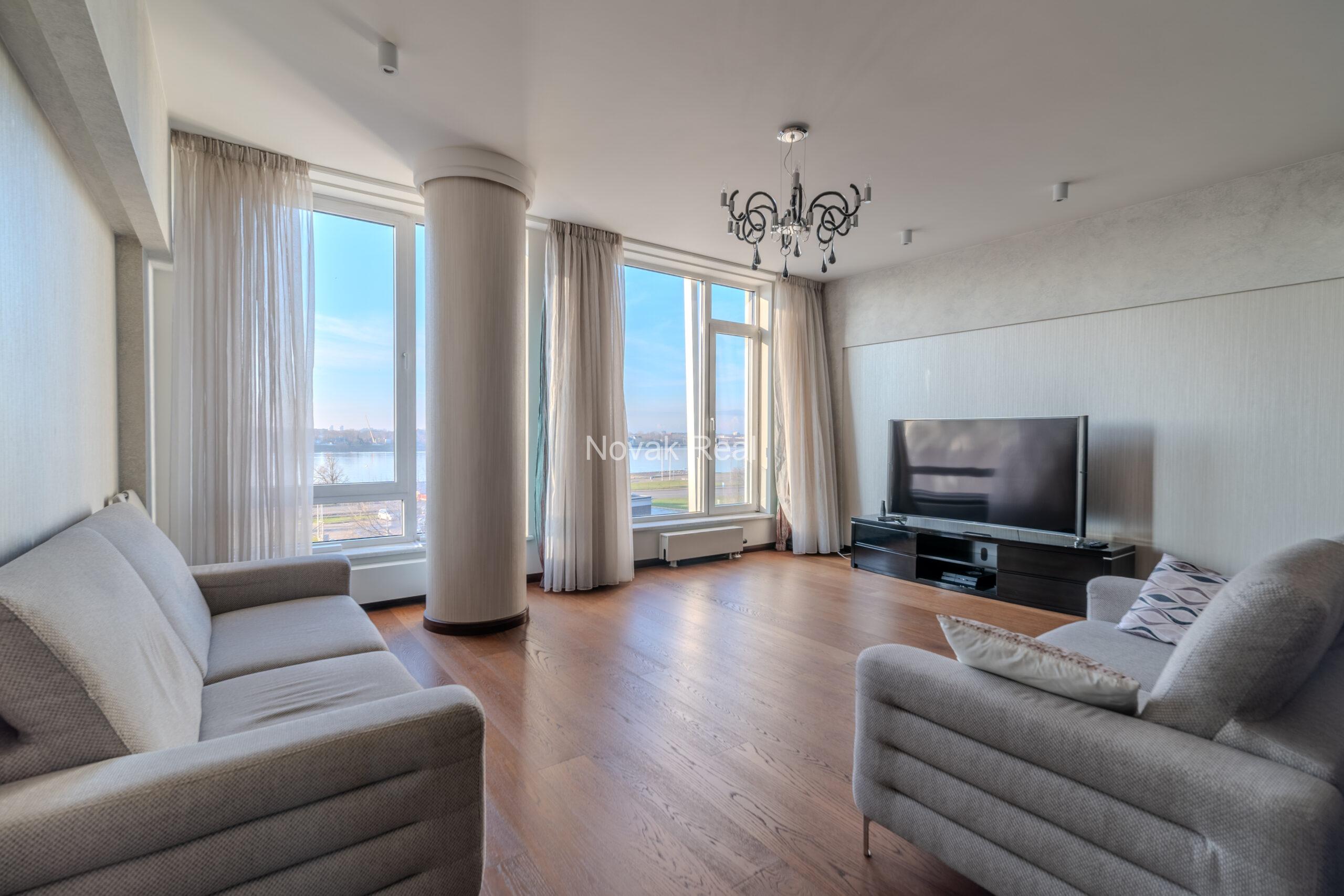 A three-room apartment is offered for sale in the city center with a river view