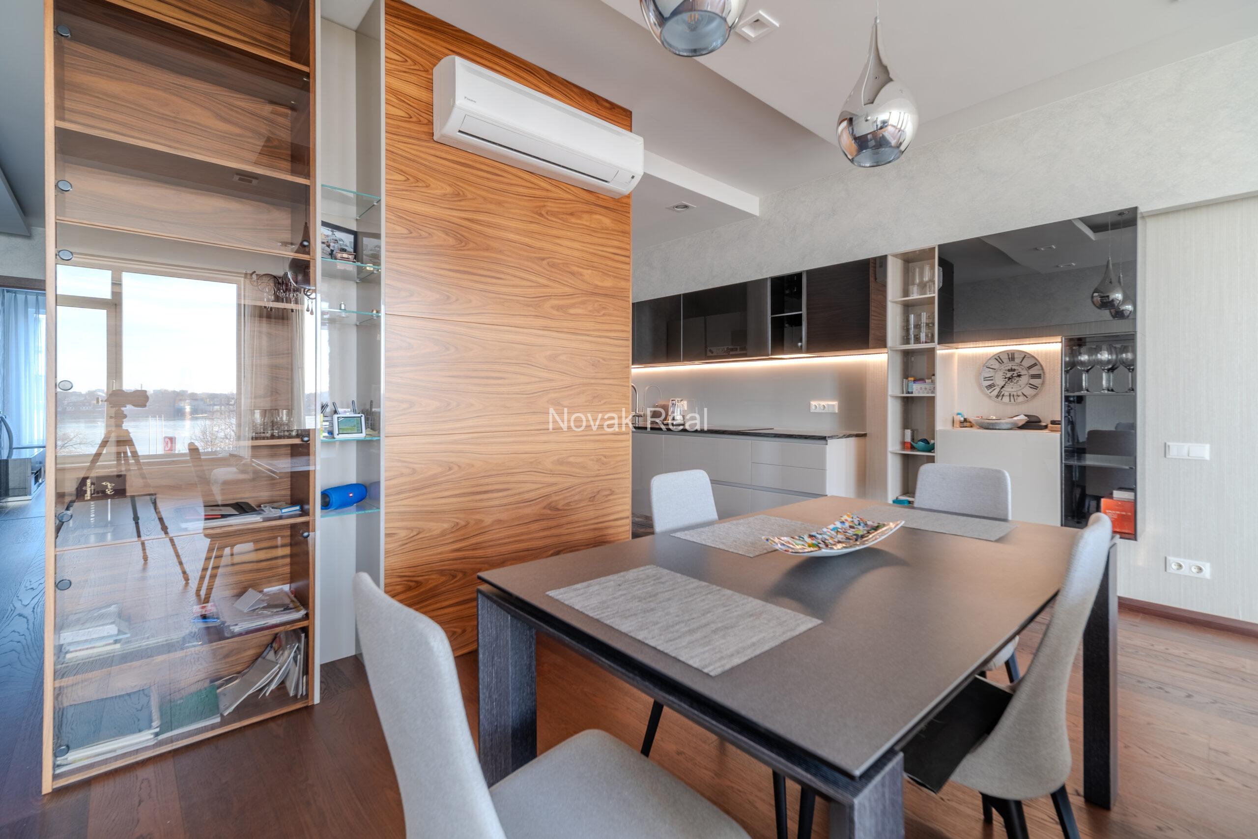 A three-room apartment is offered for sale in the city center with a river view