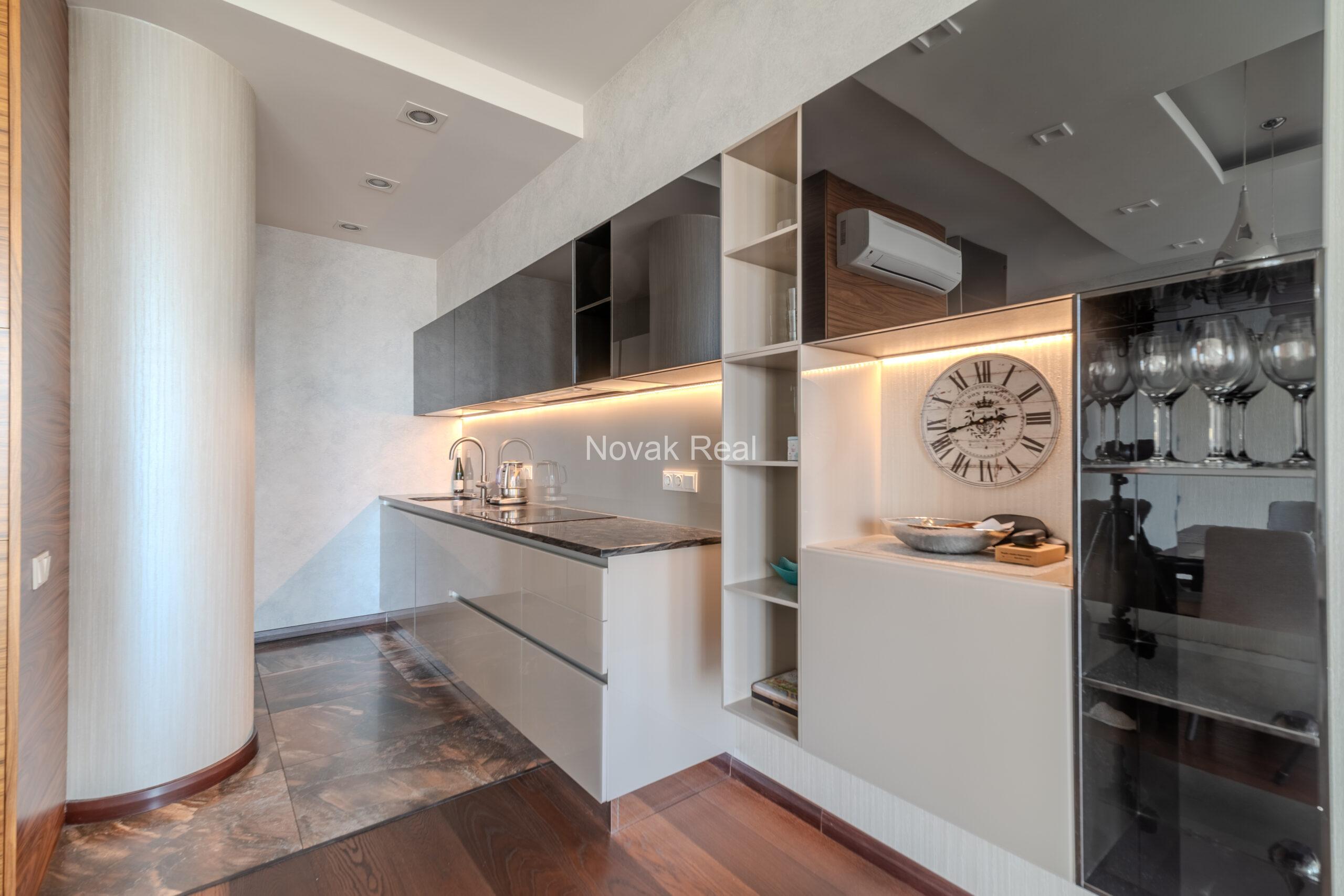 A three-room apartment is offered for sale in the city center with a river view