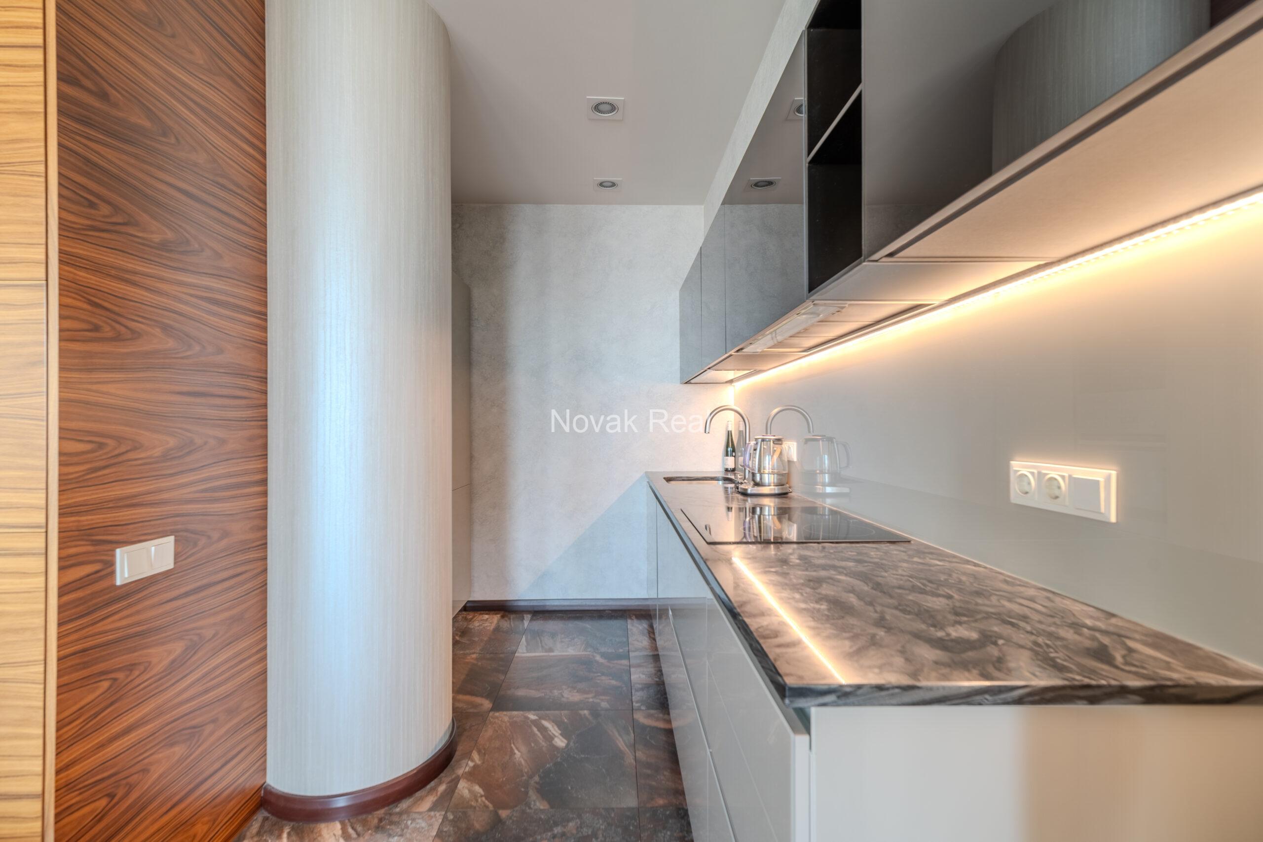 A three-room apartment is offered for sale in the city center with a river view