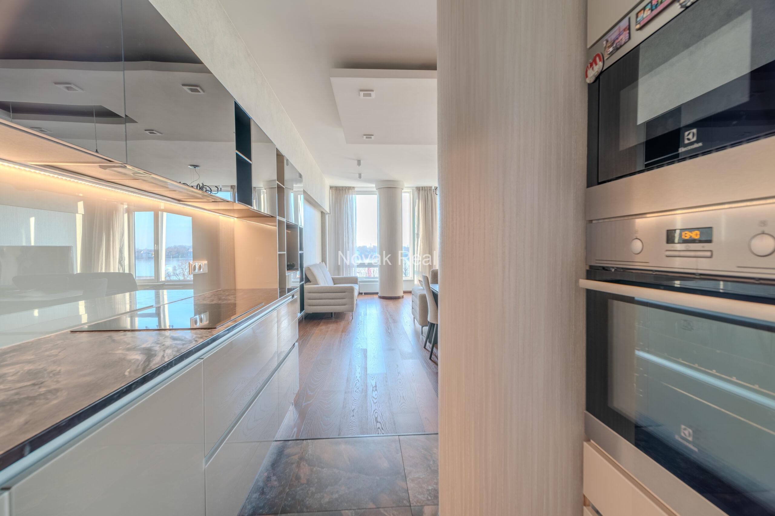 A three-room apartment is offered for sale in the city center with a river view