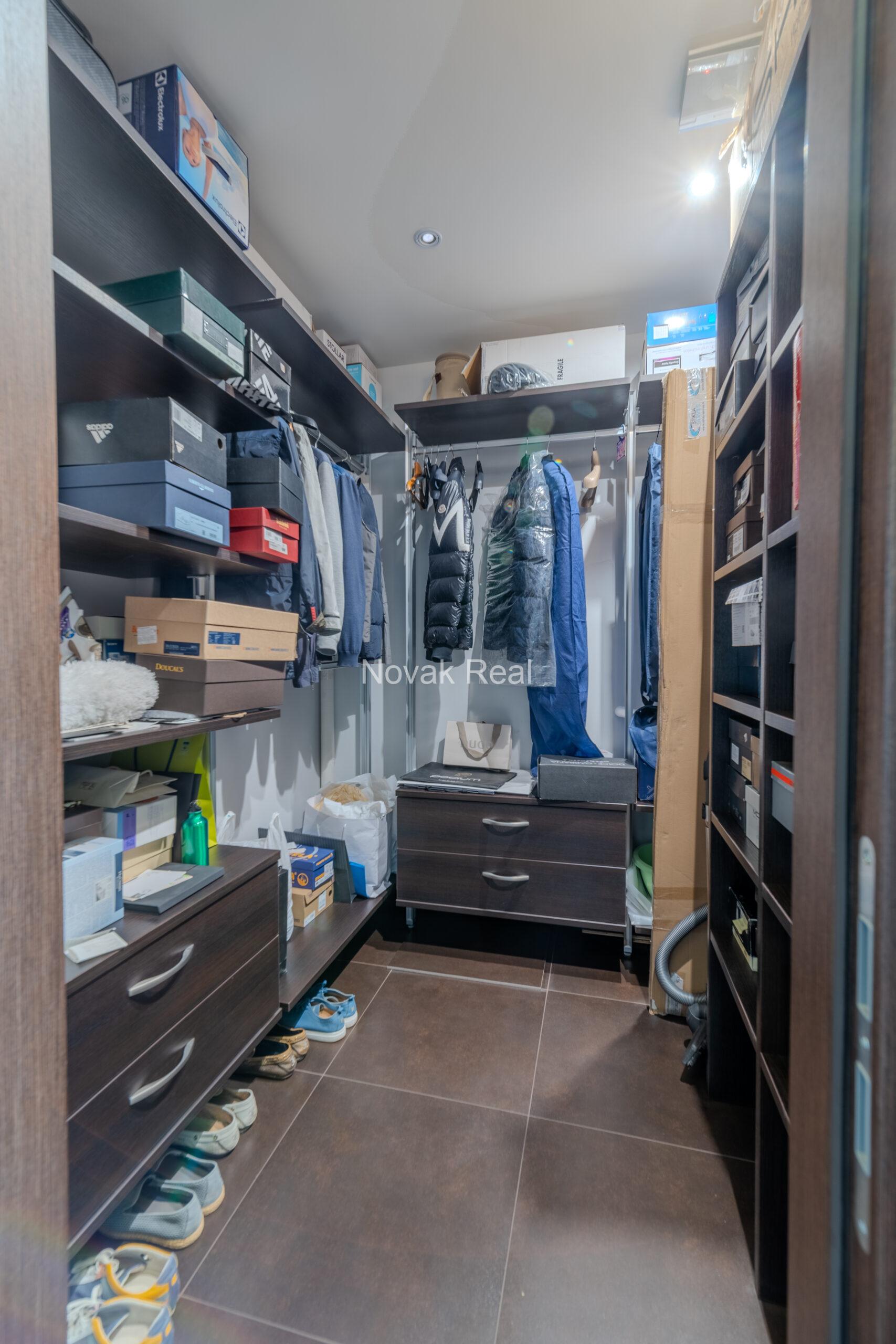 A three-room apartment is offered for sale in the city center with a river view