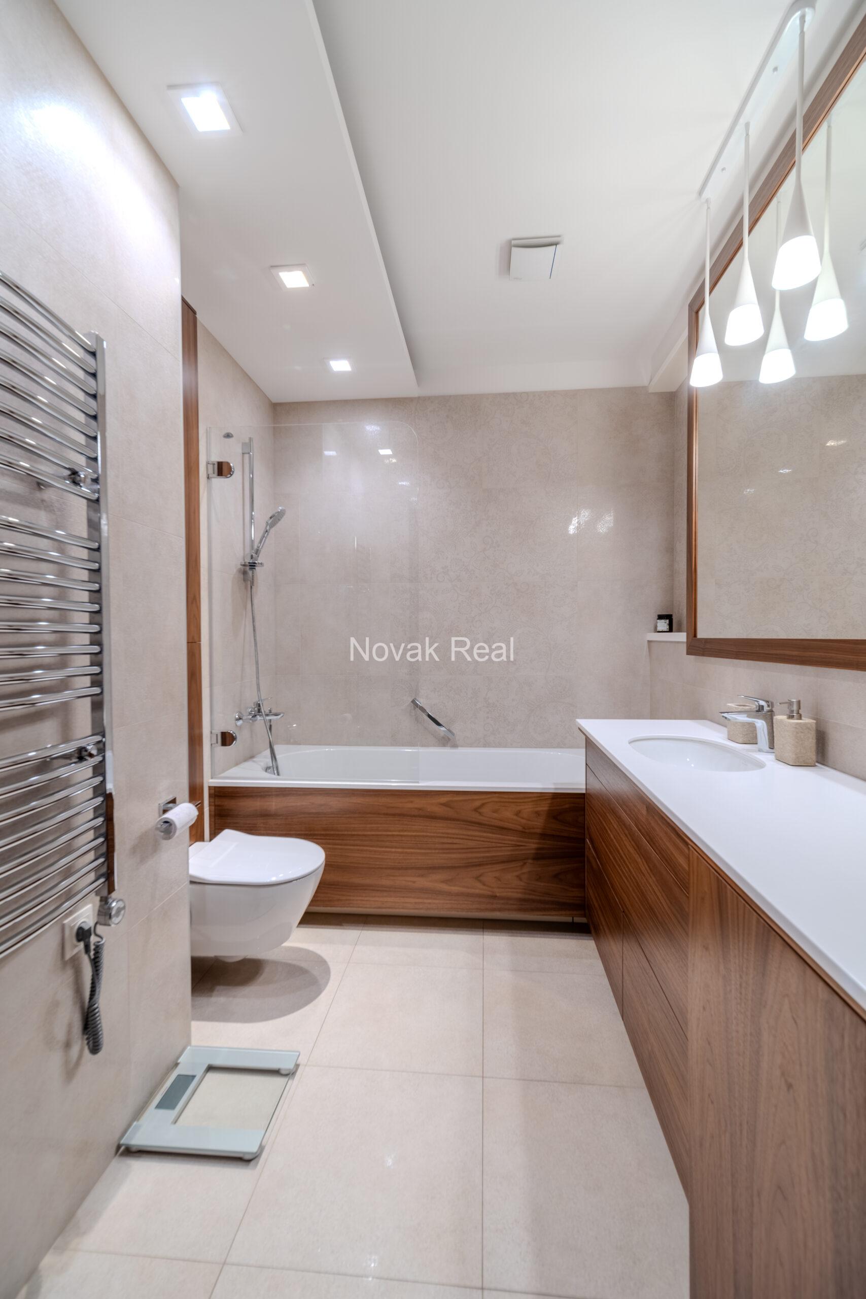 A three-room apartment is offered for sale in the city center with a river view