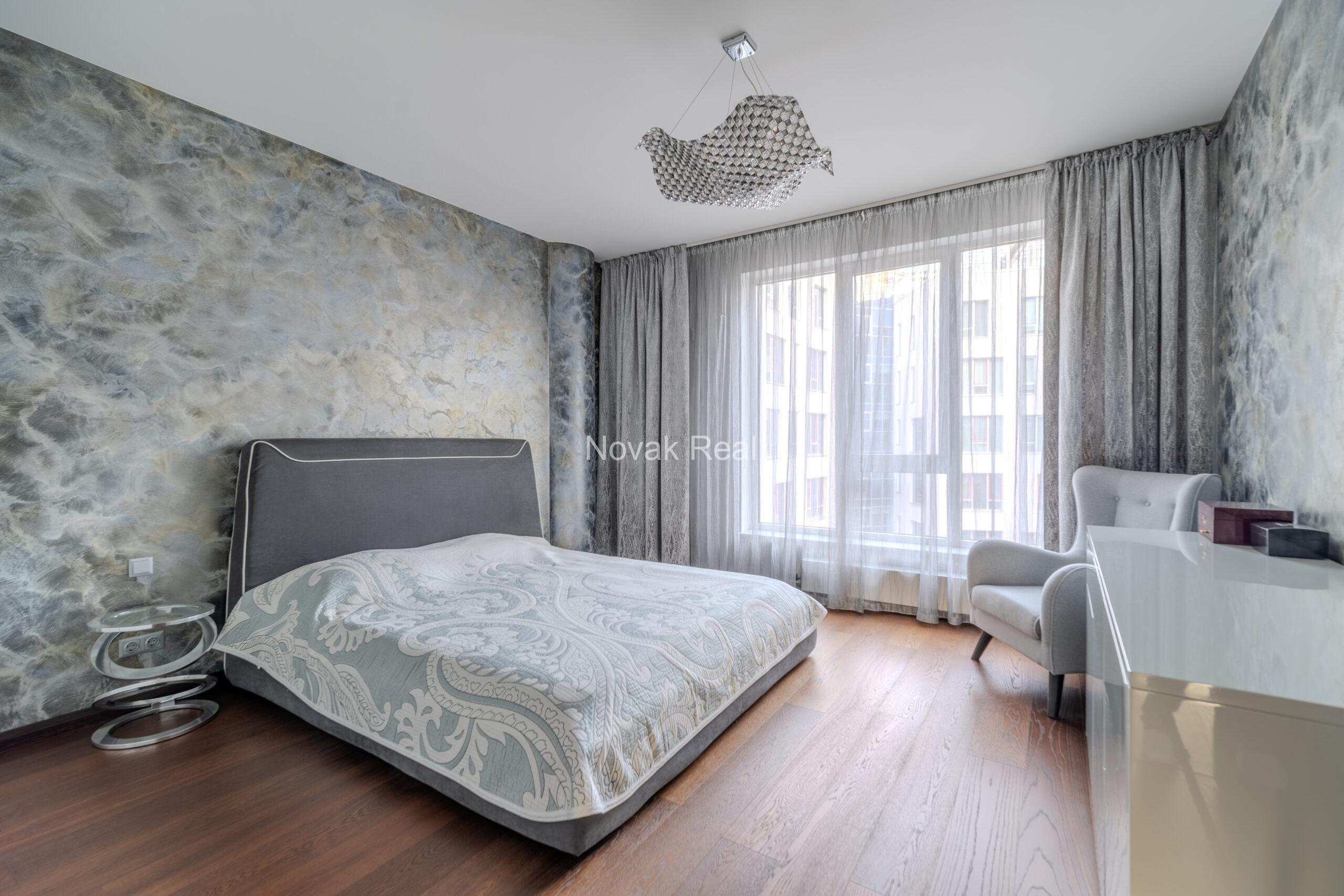 A three-room apartment is offered for sale in the city center with a river view