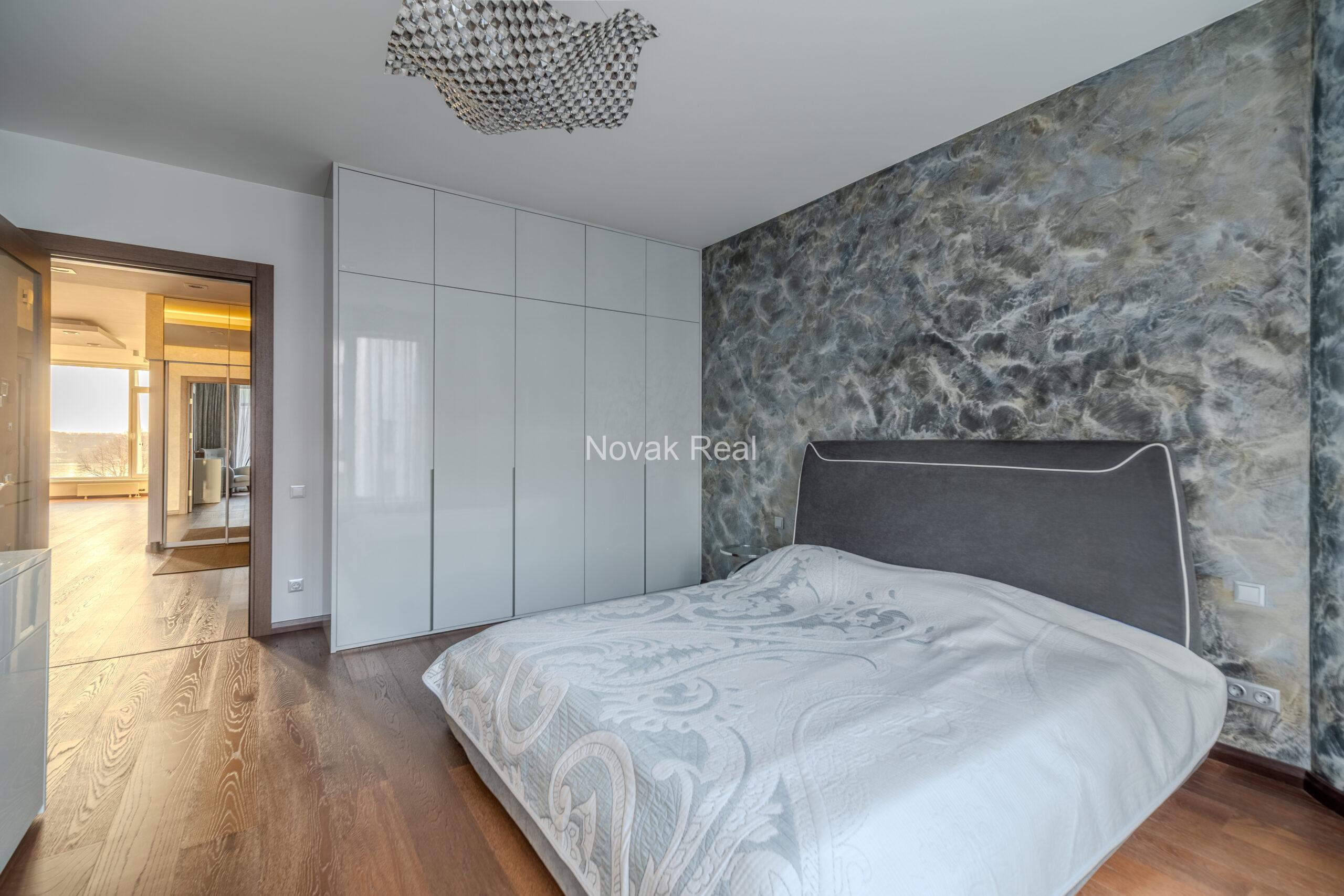 A three-room apartment is offered for sale in the city center with a river view