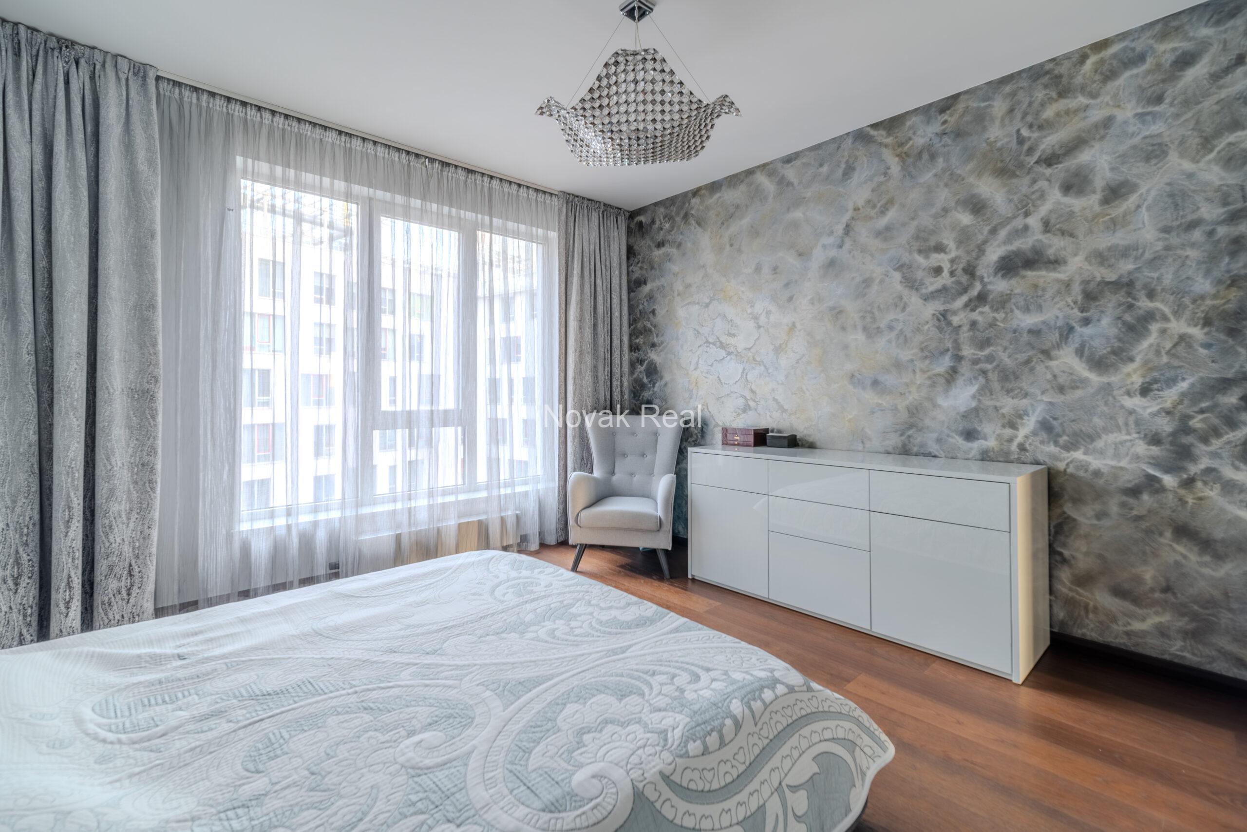 A three-room apartment is offered for sale in the city center with a river view