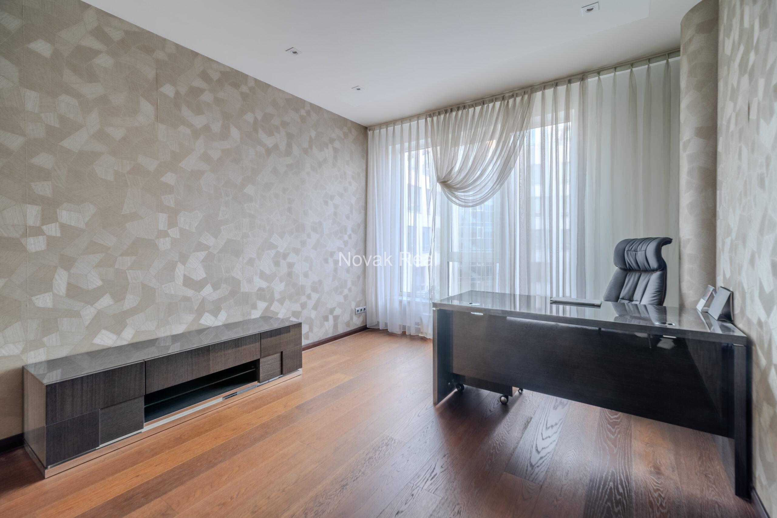 A three-room apartment is offered for sale in the city center with a river view