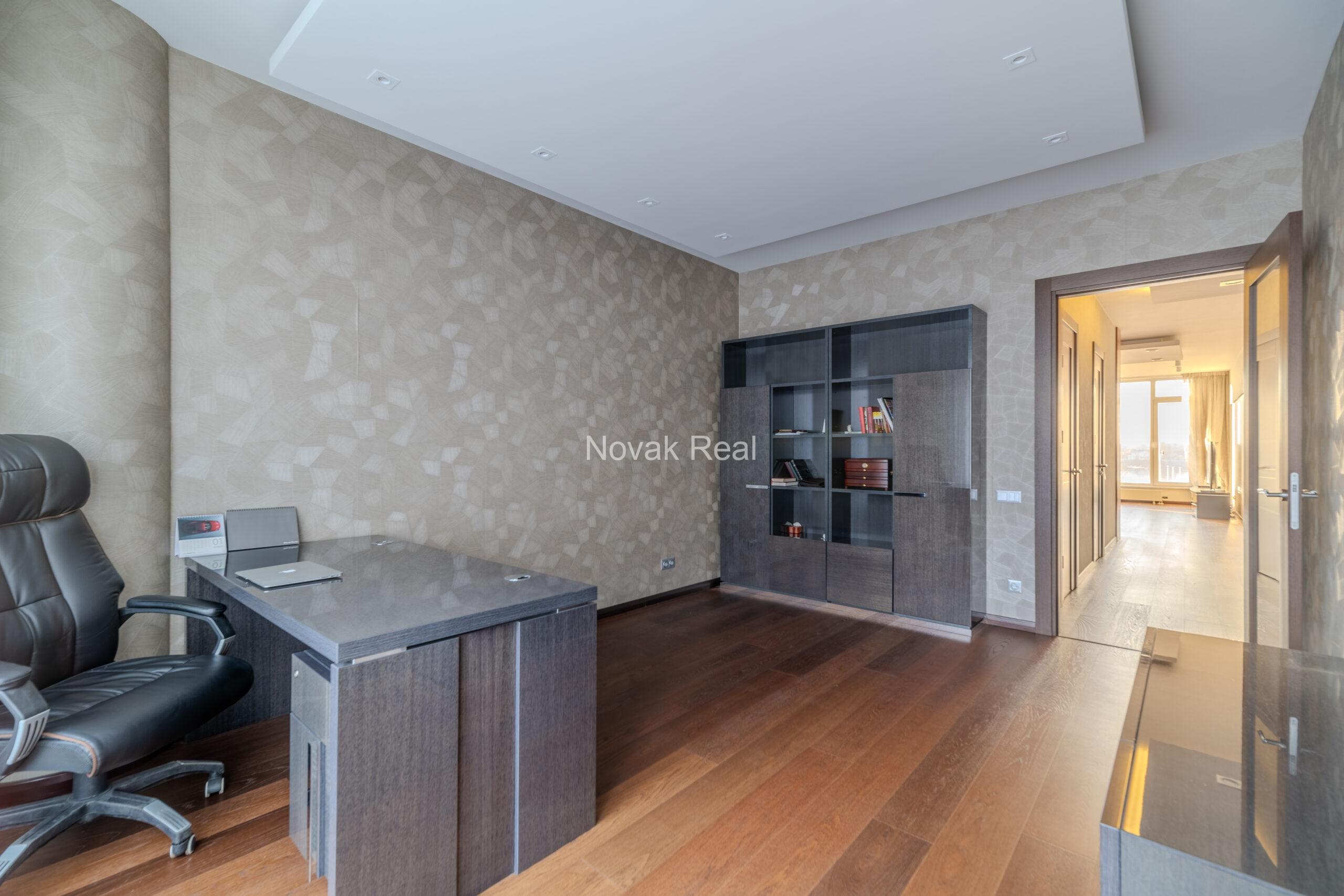A three-room apartment is offered for sale in the city center with a river view