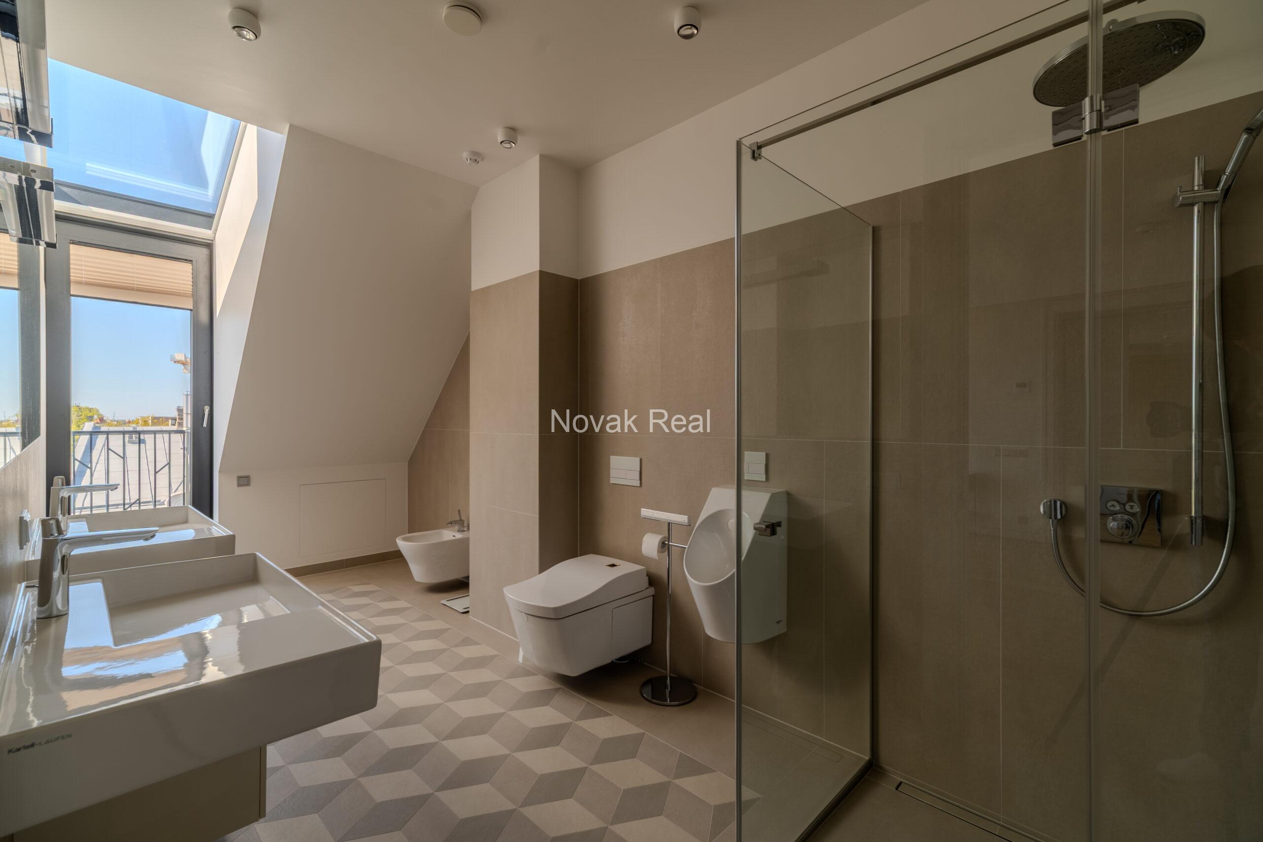 A bright and spacious four-bedroom apartment is offered for sale in the prestigious new development Club Central Residence II
