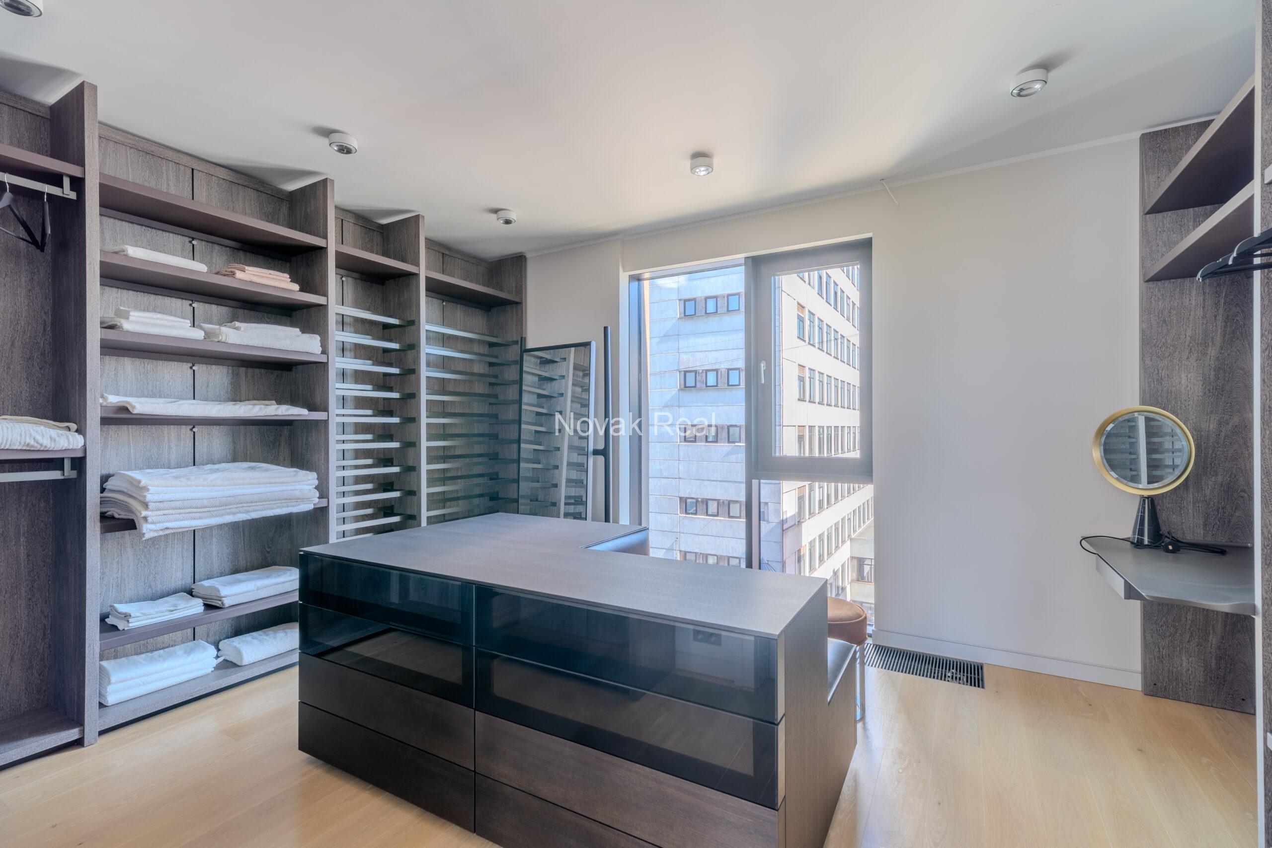 A bright and spacious four-bedroom apartment is offered for sale in the prestigious new development Club Central Residence II