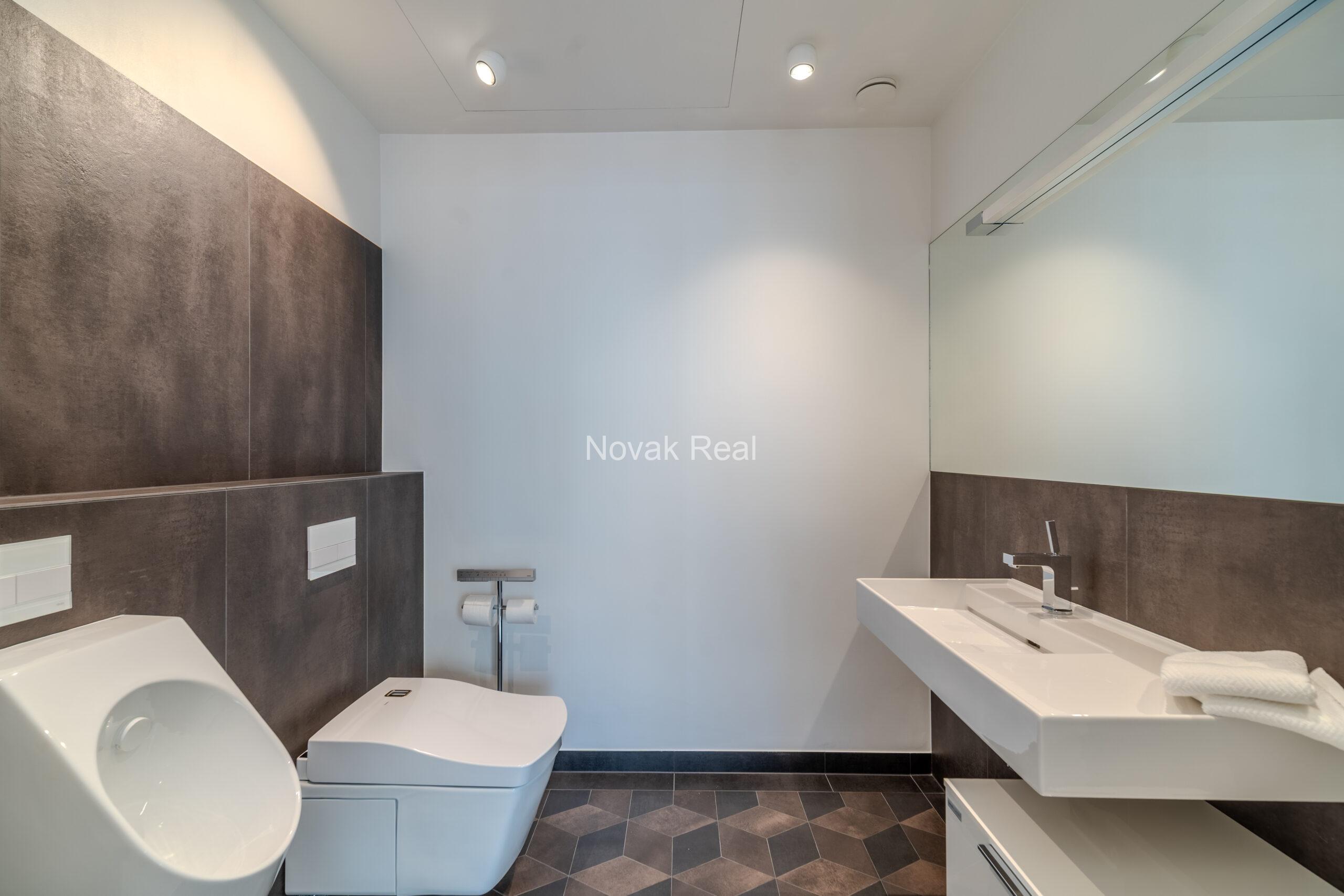 A bright and spacious four-bedroom apartment is offered for sale in the prestigious new development Club Central Residence II