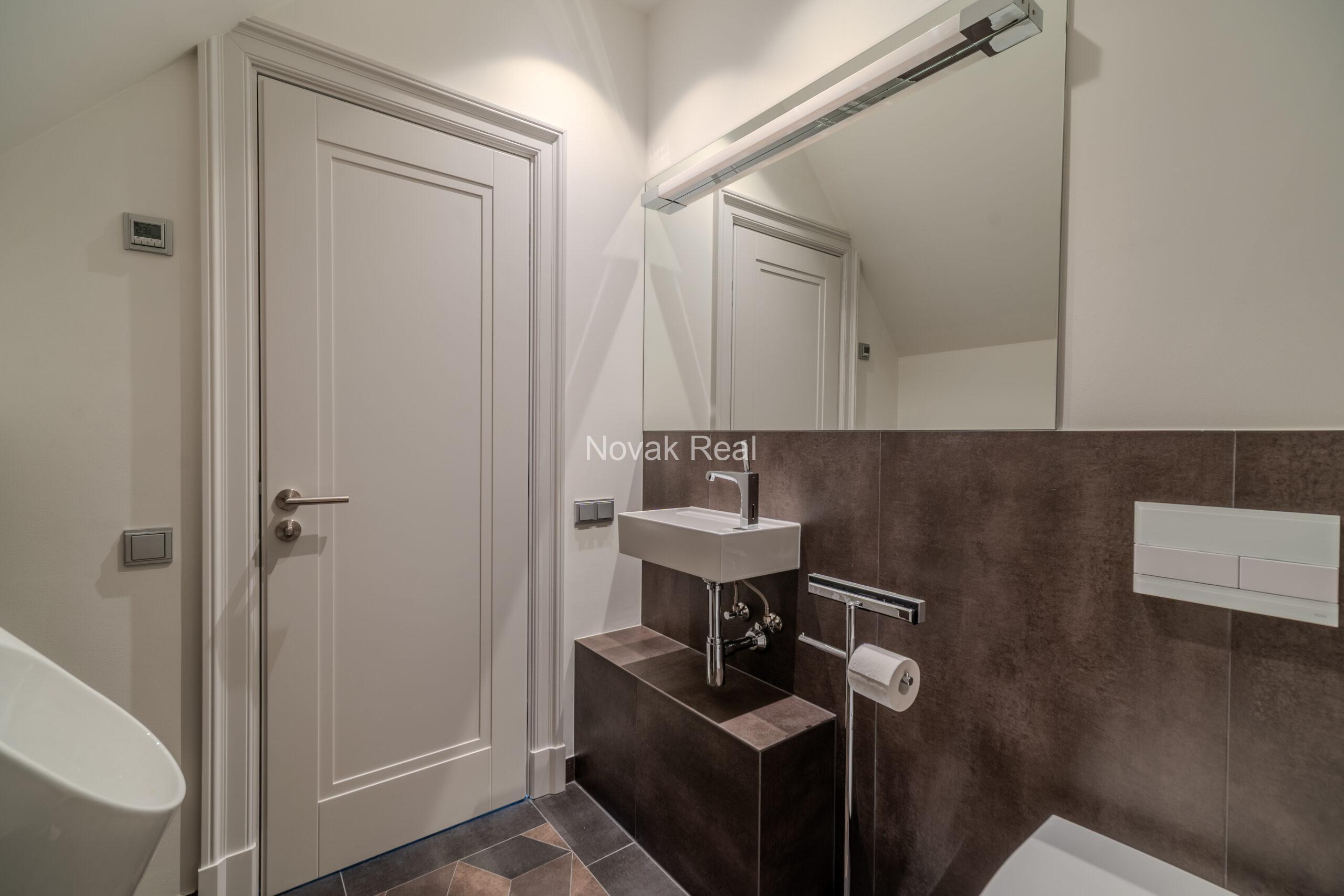 A bright and spacious four-bedroom apartment is offered for sale in the prestigious new development Club Central Residence II