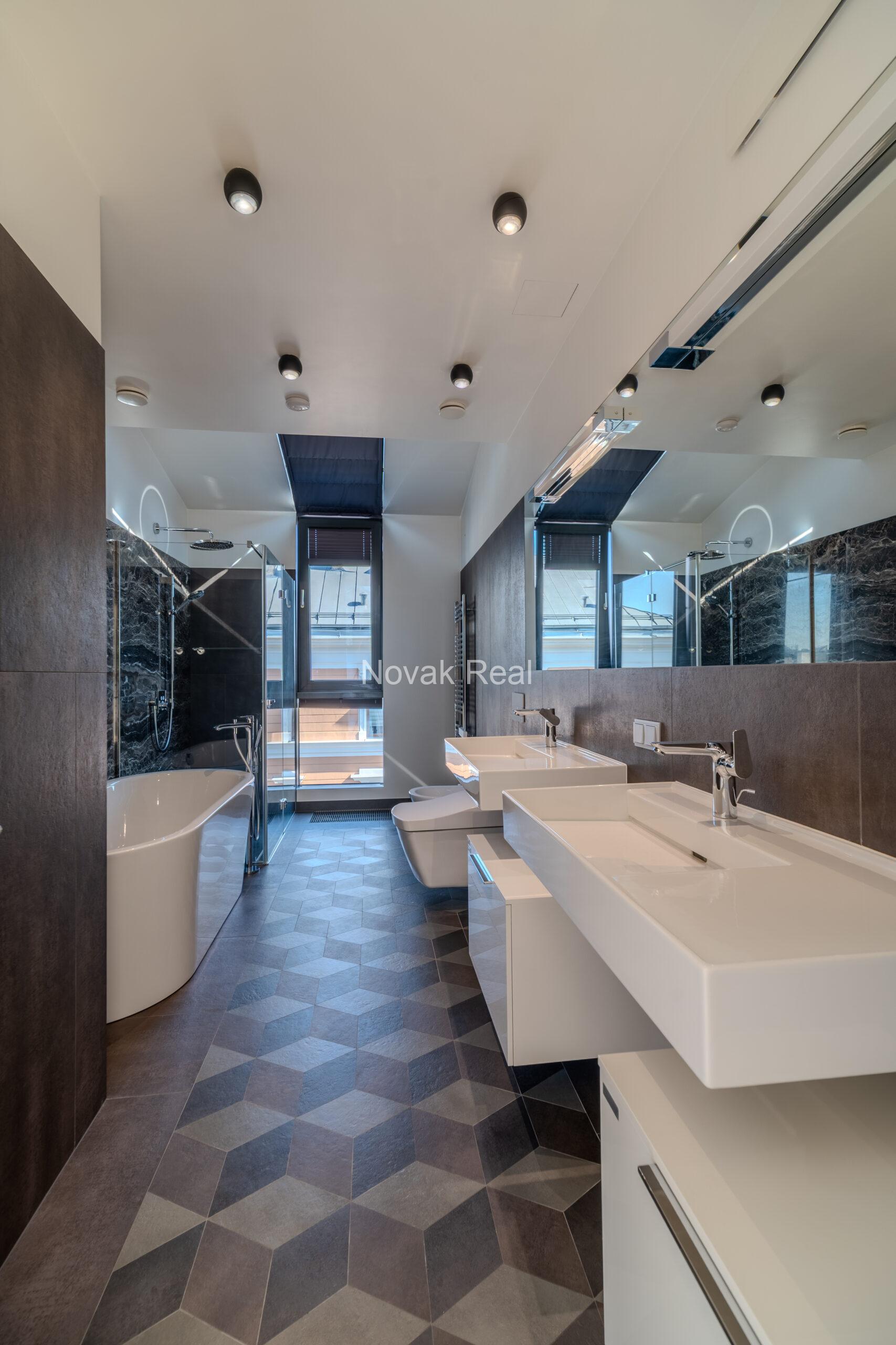 A bright and spacious four-bedroom apartment is offered for sale in the prestigious new development Club Central Residence II