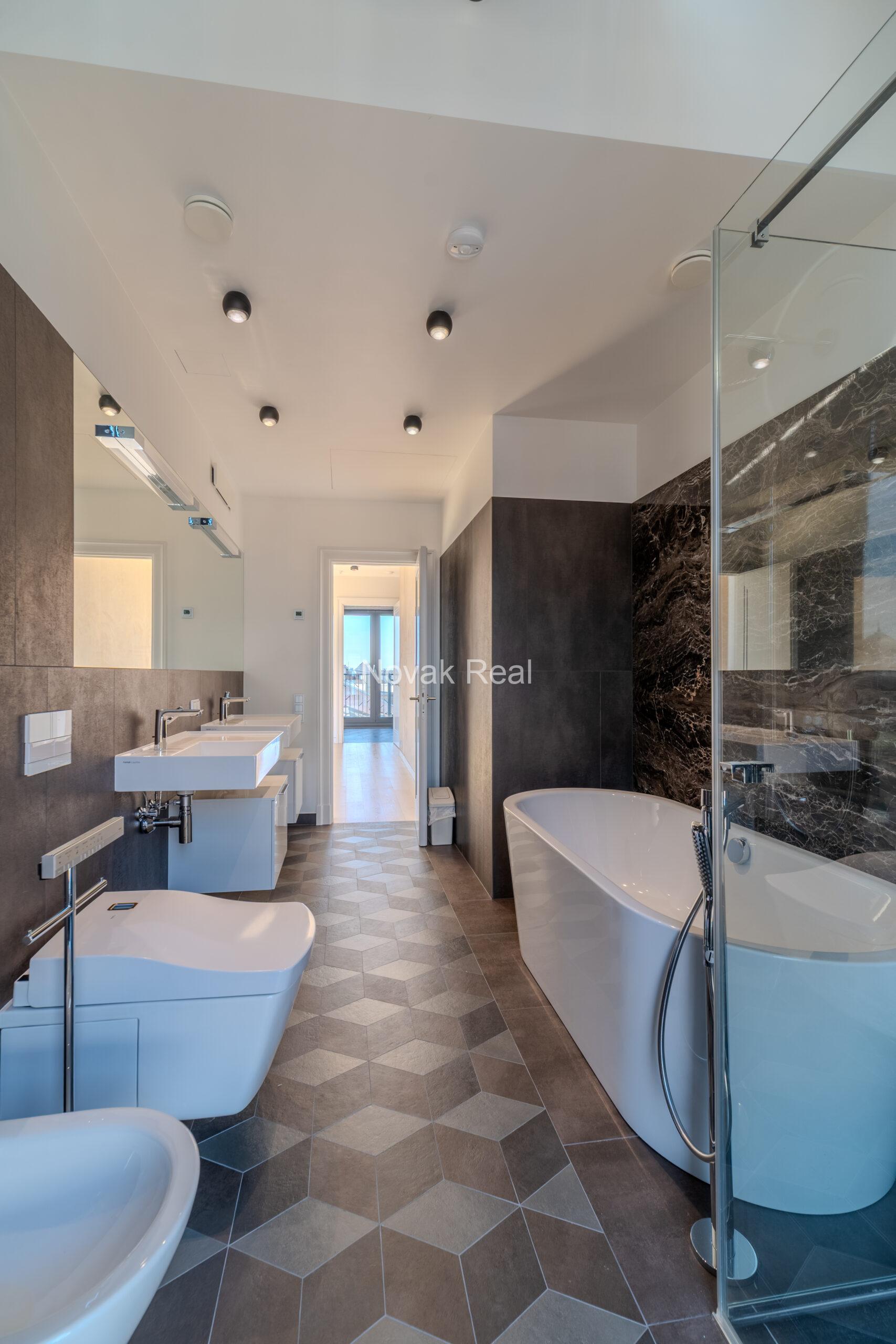 A bright and spacious four-bedroom apartment is offered for sale in the prestigious new development Club Central Residence II