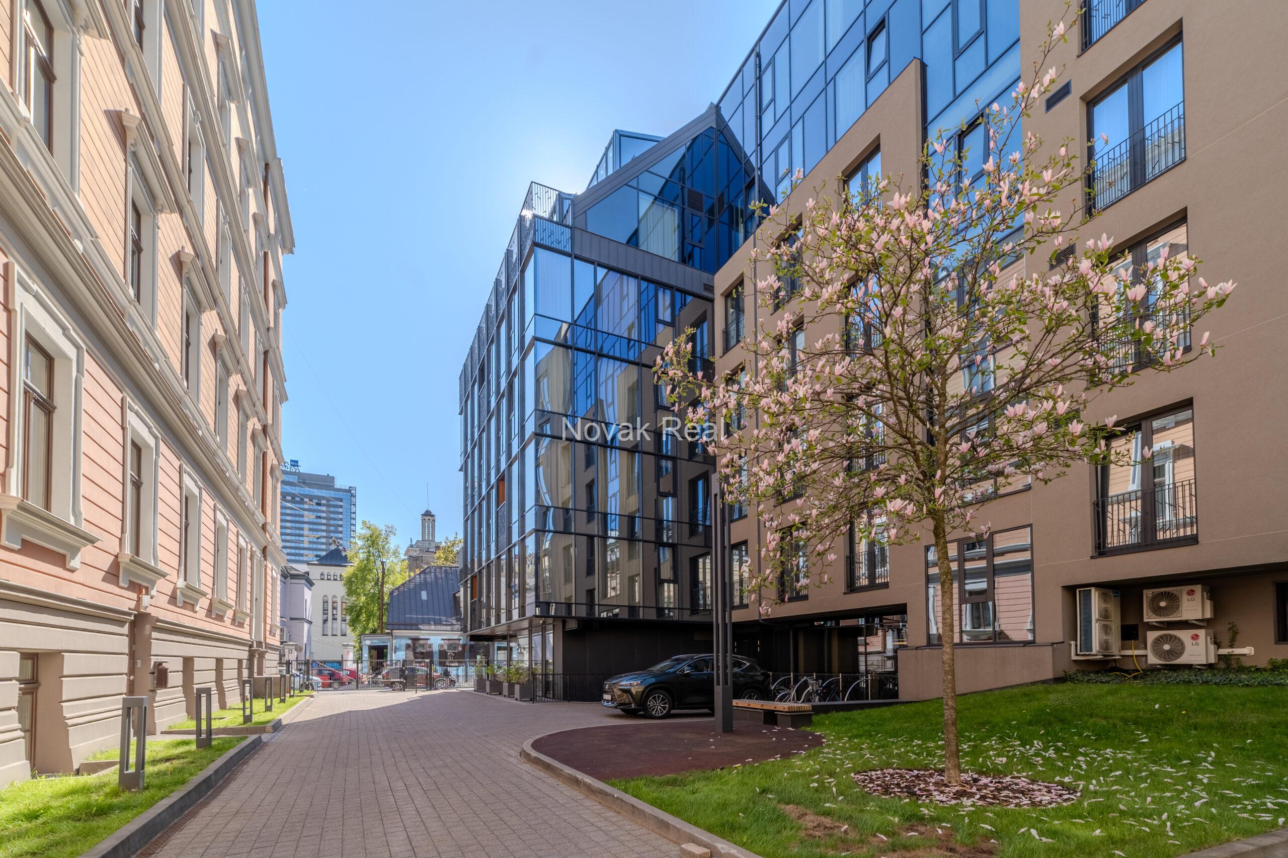 A bright and spacious four-bedroom apartment is offered for sale in the prestigious new development Club Central Residence II