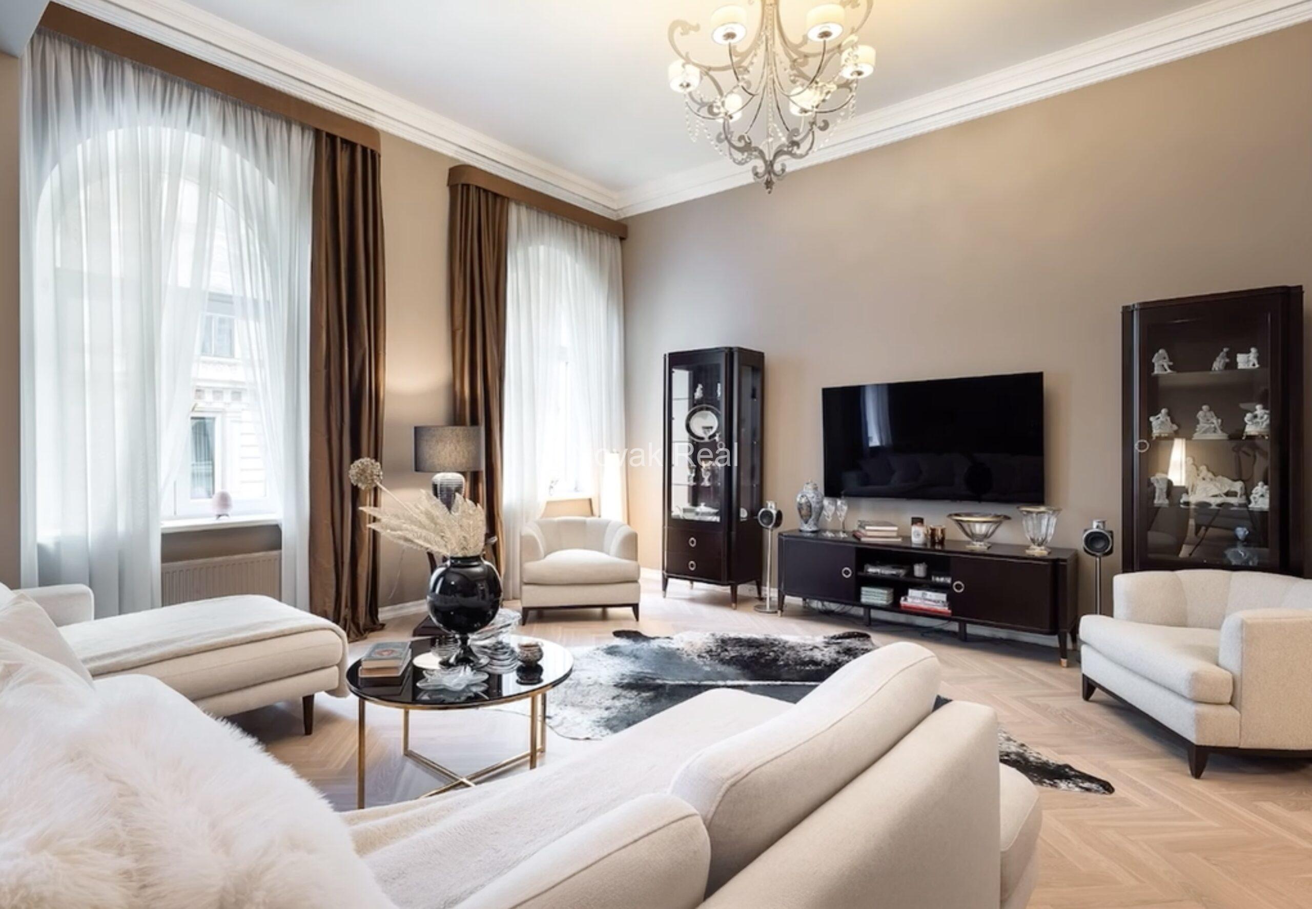An elegant apartment is offered for sale in a fully renovated building