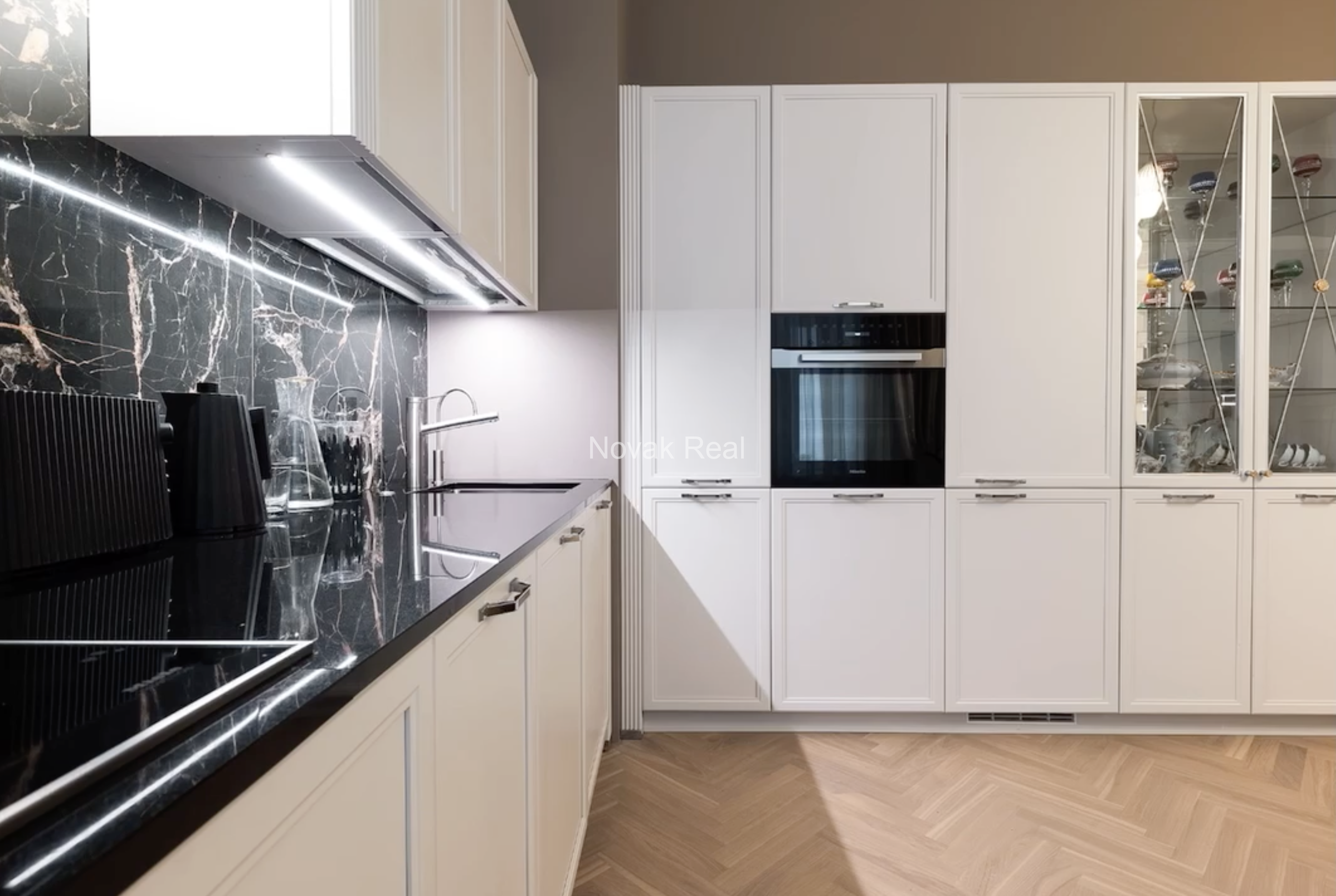 An elegant apartment is offered for sale in a fully renovated building