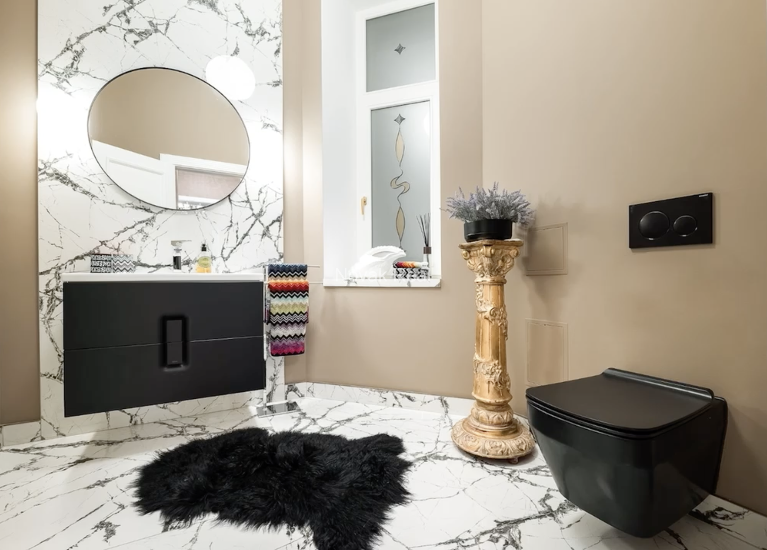 An elegant apartment is offered for sale in a fully renovated building