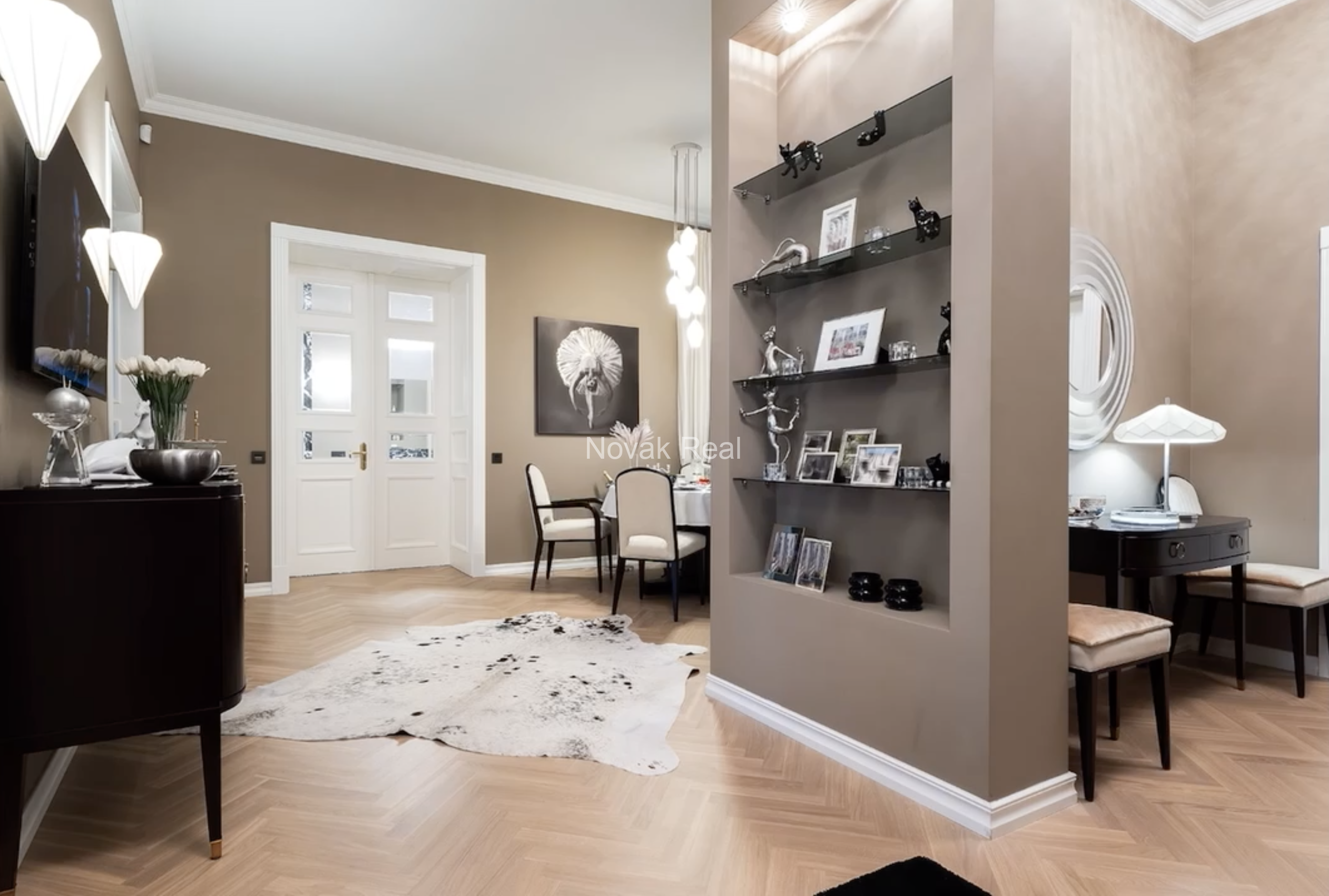 An elegant apartment is offered for sale in a fully renovated building
