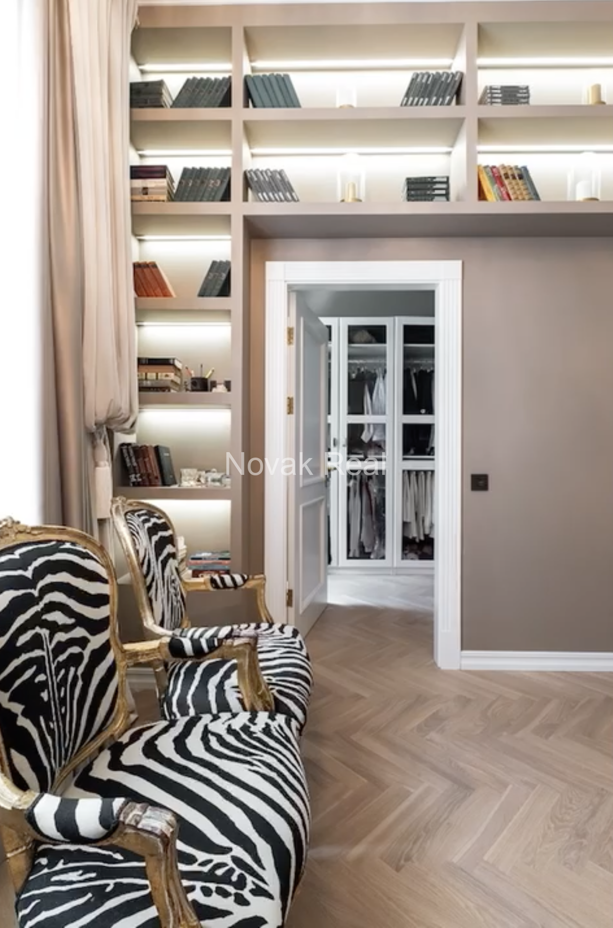 An elegant apartment is offered for sale in a fully renovated building