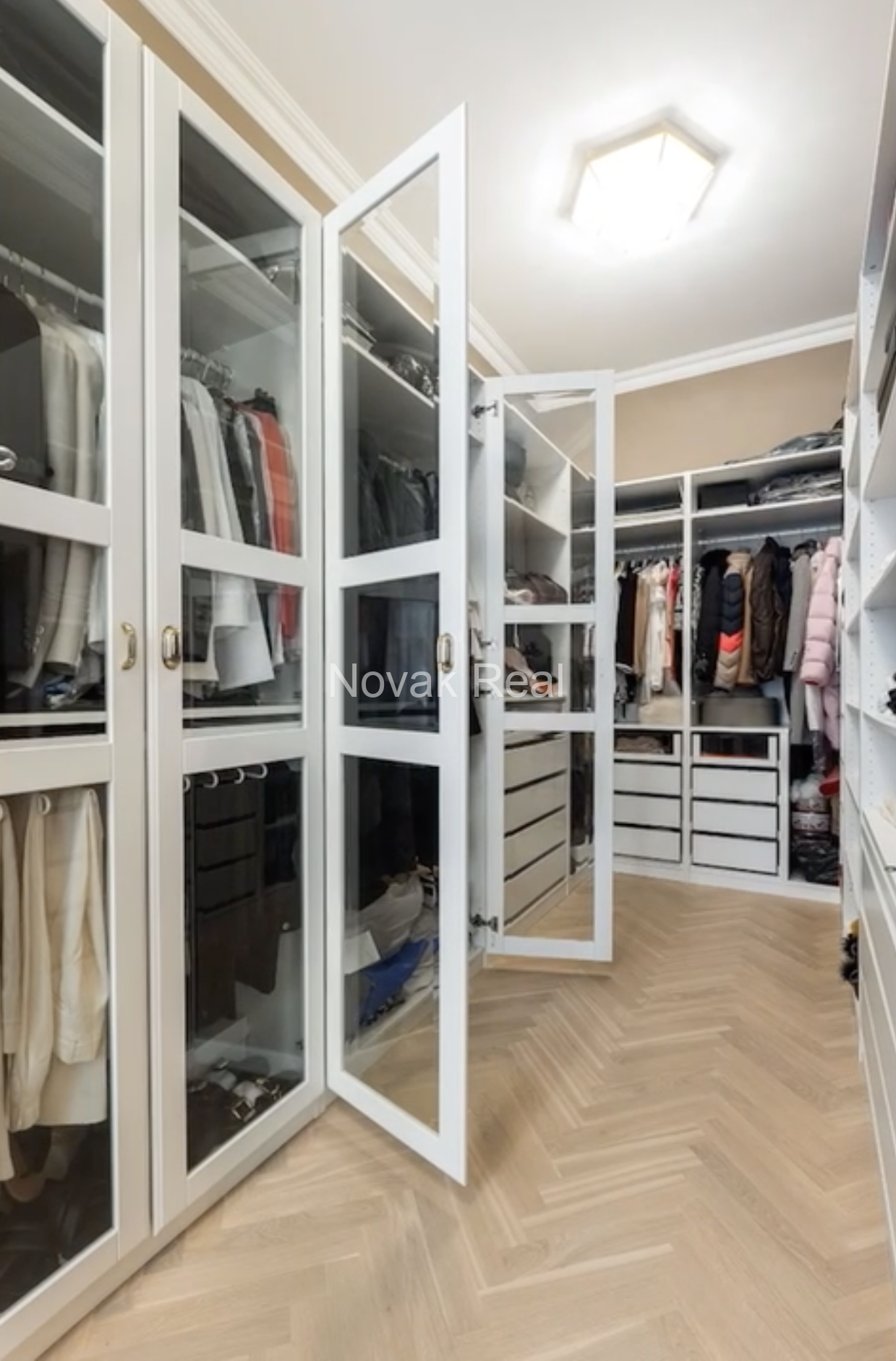 An elegant apartment is offered for sale in a fully renovated building