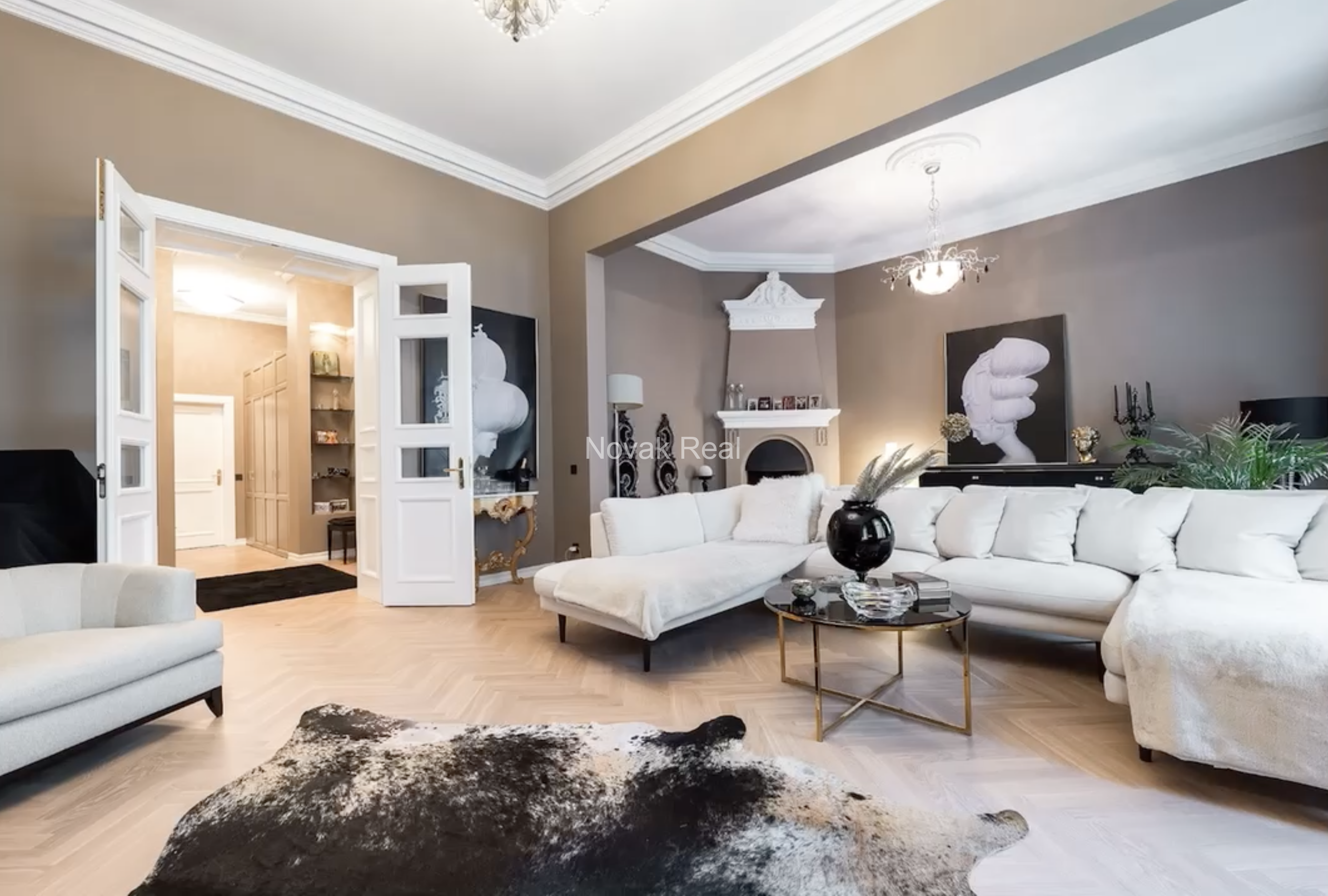 An elegant apartment is offered for sale in a fully renovated building