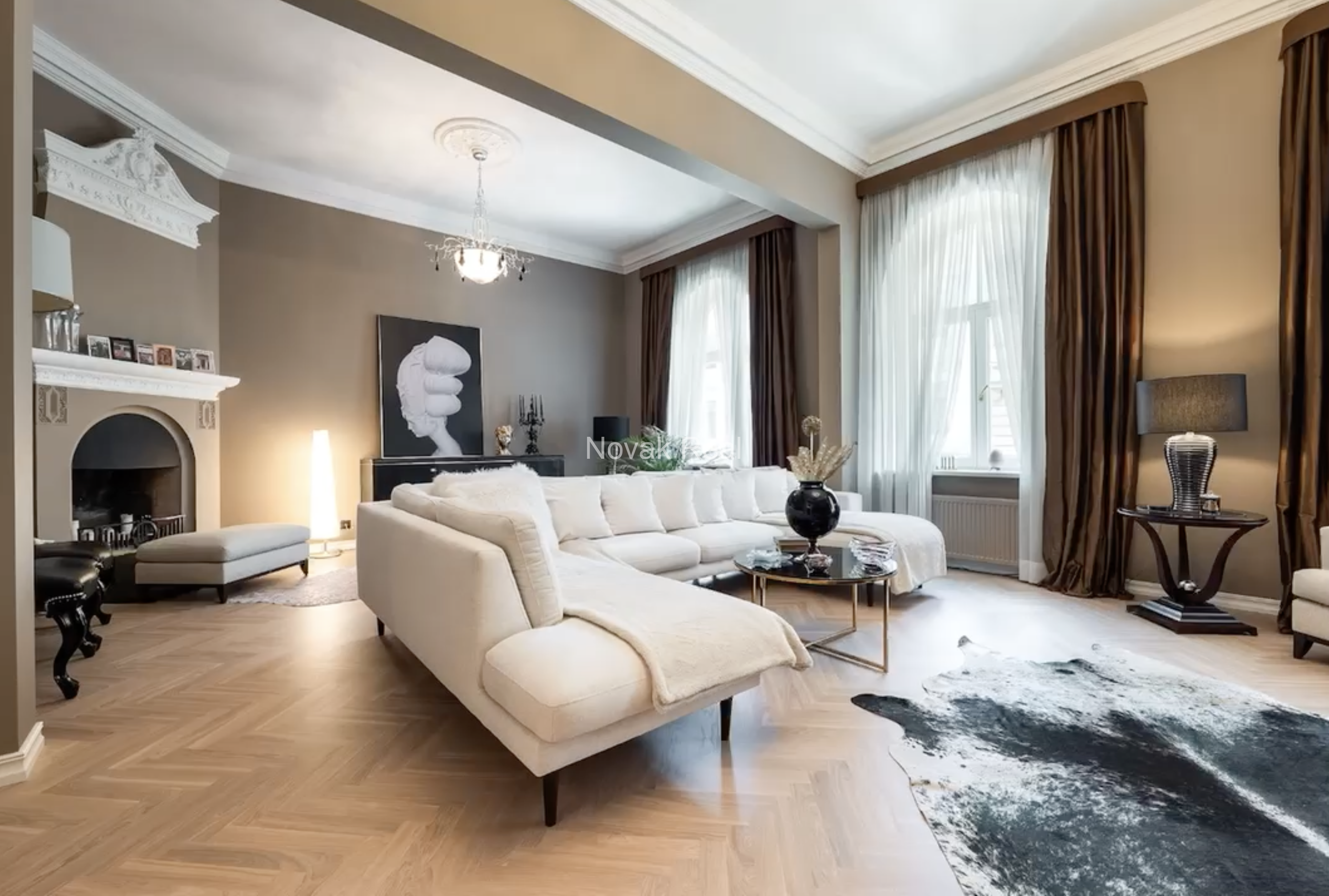 An elegant apartment is offered for sale in a fully renovated building