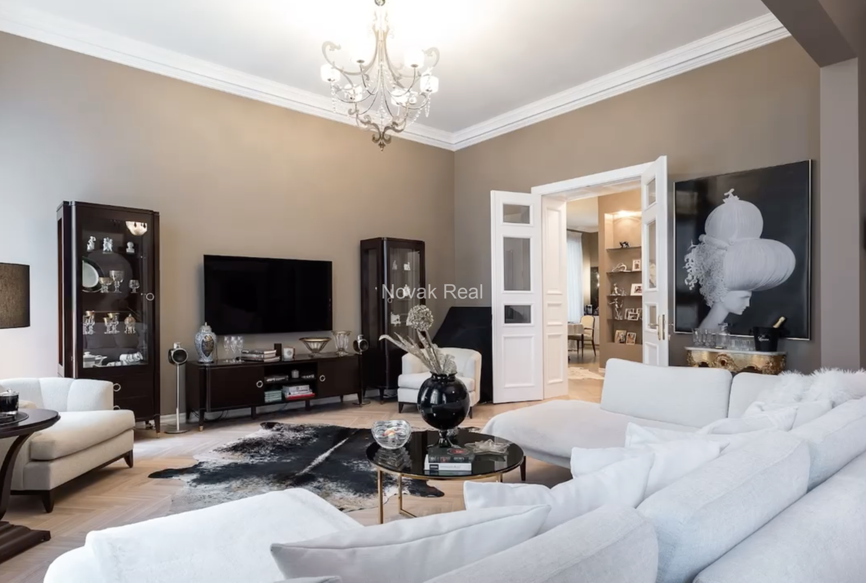 An elegant apartment is offered for sale in a fully renovated building