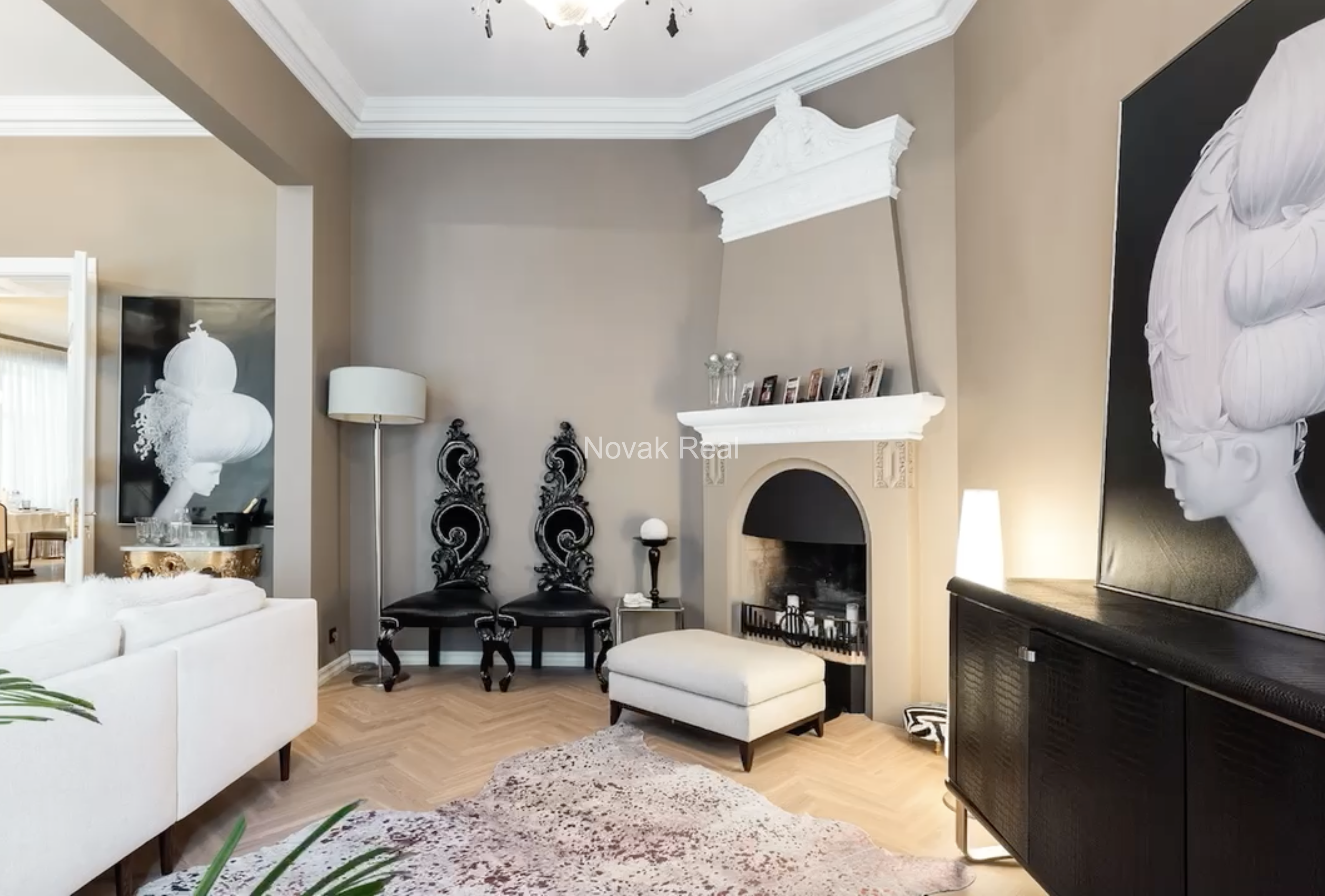 An elegant apartment is offered for sale in a fully renovated building