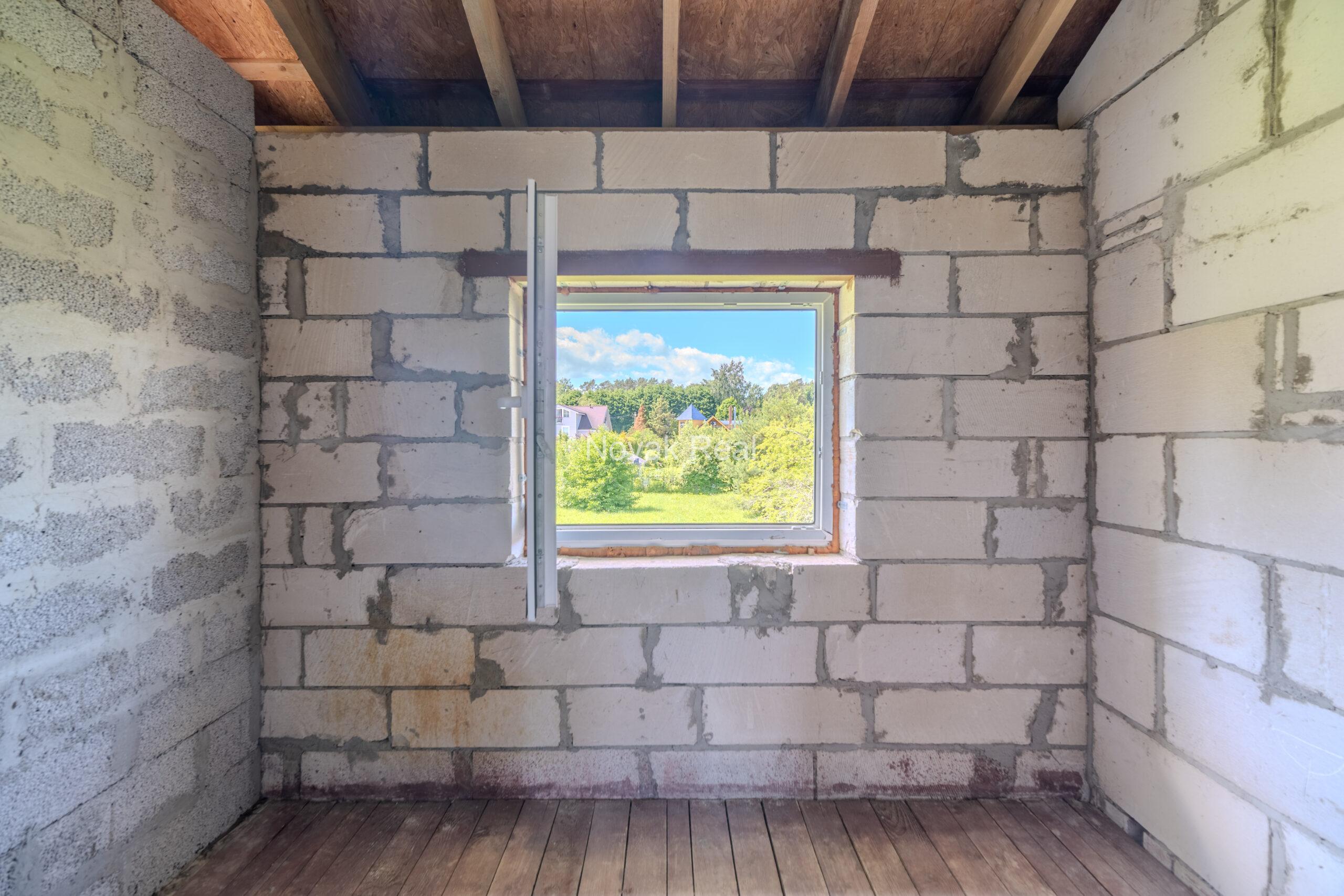 Land plot of 1200 m² with an unfinished house for sale in Melluži, Jurmala